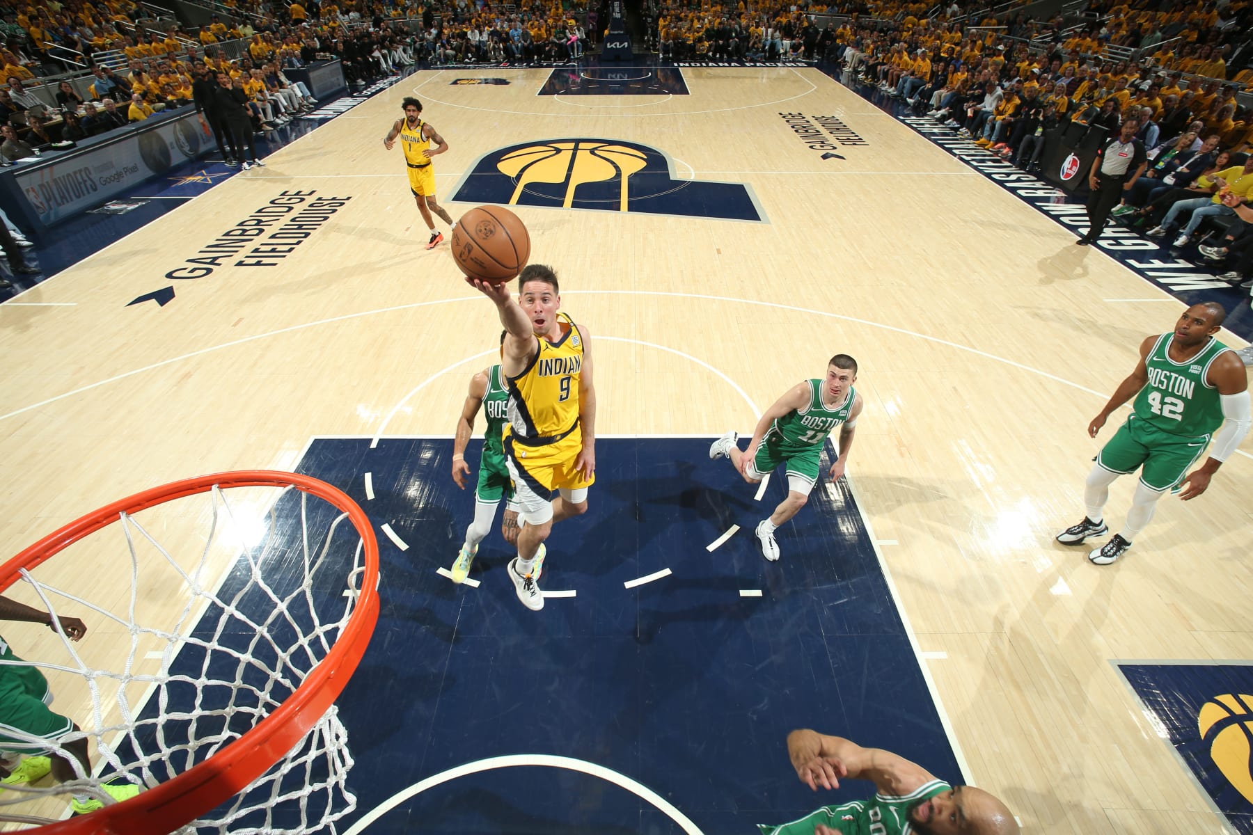 INDIANAPOLIS, IN - MAY 27: T.J. McConnell #9 of the Indiana Pacers drives to the basket during the game against the Boston Celtics during Game 4 of the Eastern Conference Finals of the 2024 NBA Playoffs on May 27, 2024 at Gainbridge Fieldhouse in Indianapolis, Indiana. NOTE TO USER: User expressly acknowledges and agrees that, by downloading and or using this Photograph, user is consenting to the terms and conditions of the Getty Images License Agreement. Mandatory Copyright Notice: Copyright 2024 NBAE (Photo by Nathaniel S. Butler/NBAE via Getty Images)