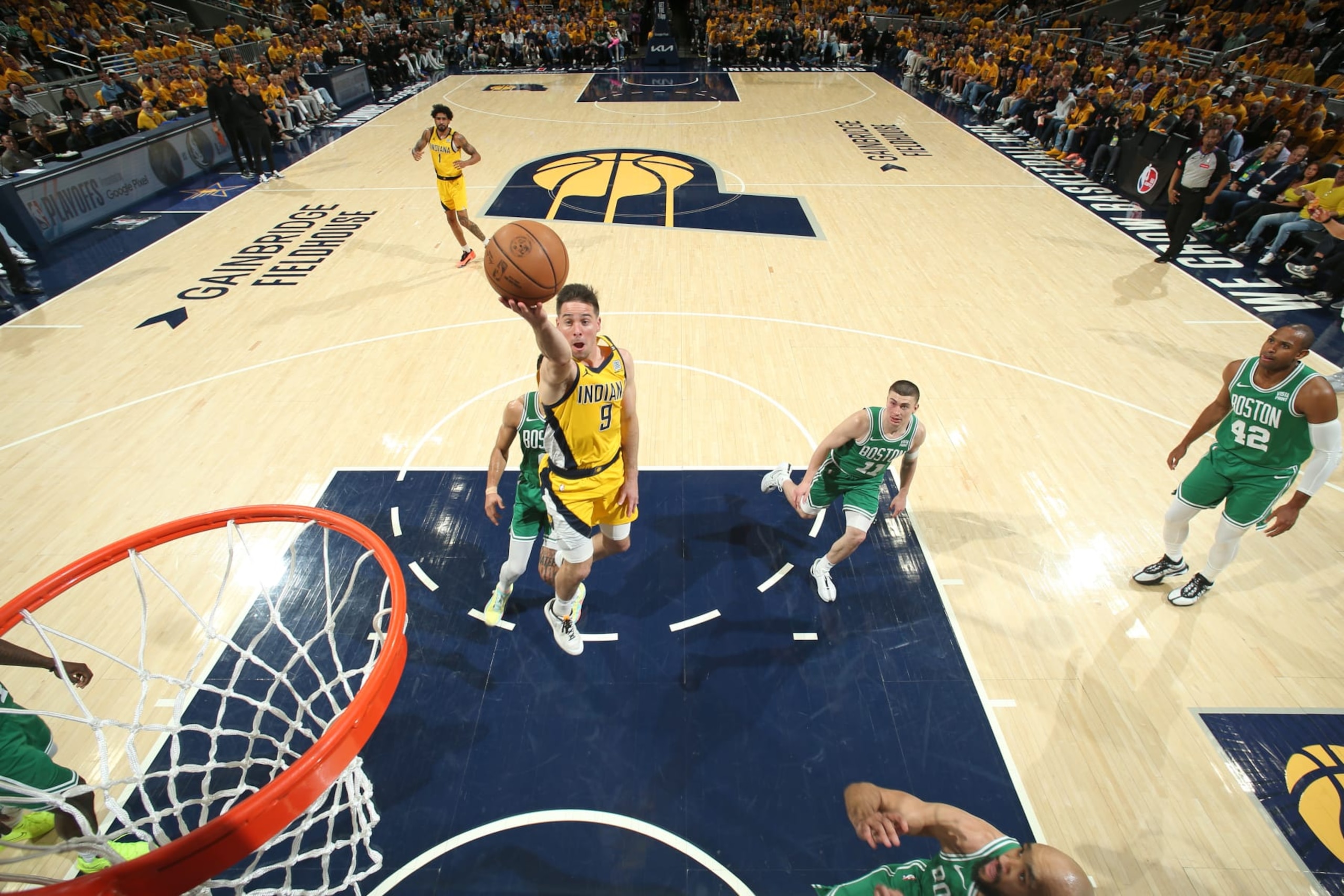 INDIANAPOLIS, IN - MAY 27: T.J. McConnell #9 of the Indiana Pacers drives to the basket during the game against the Boston Celtics during Game 4 of the Eastern Conference Finals of the 2024 NBA Playoffs on May 27, 2024 at Gainbridge Fieldhouse in Indianapolis, Indiana. NOTE TO USER: User expressly acknowledges and agrees that, by downloading and or using this Photograph, user is consenting to the terms and conditions of the Getty Images License Agreement. Mandatory Copyright Notice: Copyright 2024 NBAE (Photo by Nathaniel S. Butler/NBAE via Getty Images)