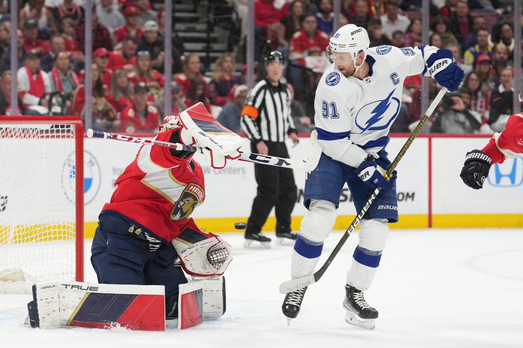 SUNRISE, FL - APRIL 29: Florida Panthers goaltender Sergei Bobrovsky (72) makes a save as Tampa Bay Lightning center Steven Stamkos (91) tries to deflect the puck in goal in the first periodduring game four of the Eastern Conference First Round between the Tampa Bay Lightning and the Florida Panthers at Amerant Bank Arena, Sunrise, Fla. (Photo by Peter Joneleit/Icon Sportswire via Getty Images)