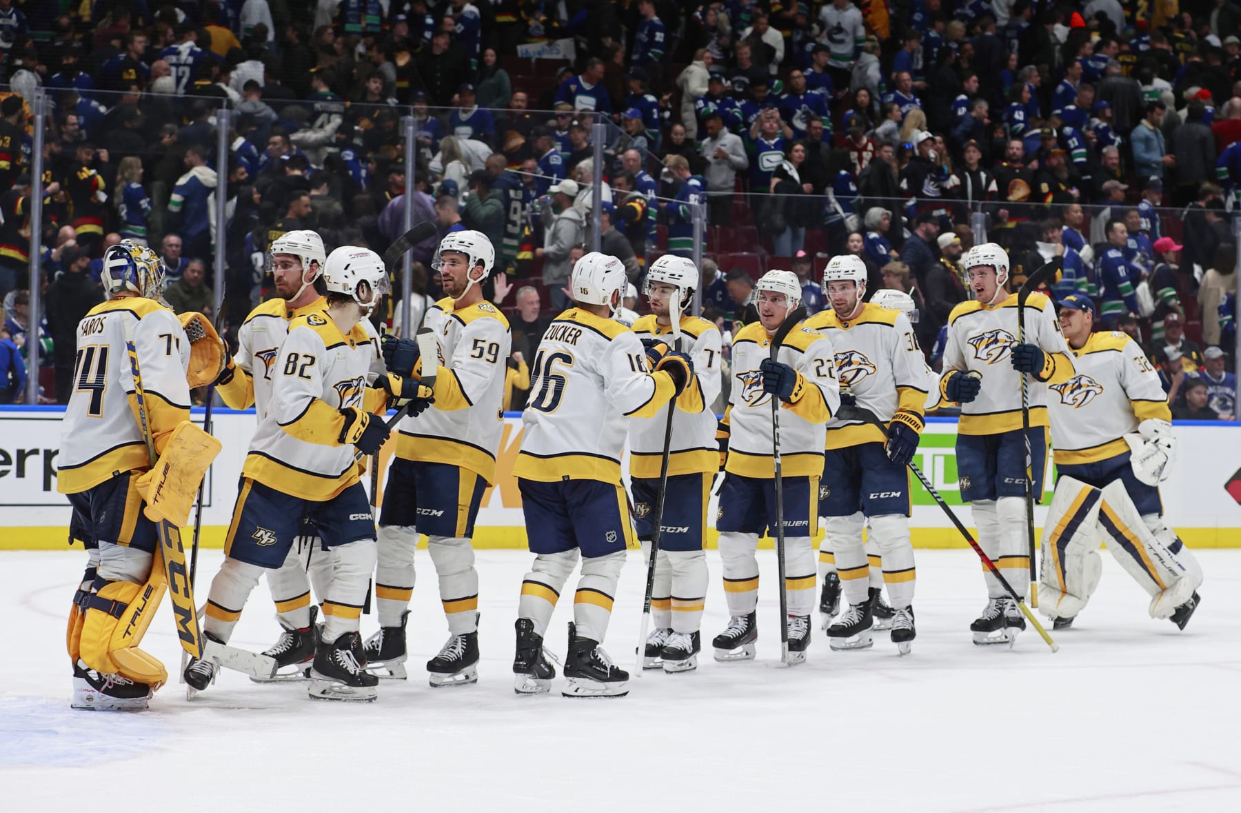 VANCOUVER, CANADA - APRIL 30: The Nashville Predators celebrate after winning against the Vancouver Canucks in Game Five of the First Round of the 2024 Stanley Cup Playoffs at Rogers Arena on April 30, 2024 in Vancouver, British Columbia, Canada. (Photo by Jeff Vinnick/NHLI via Getty Images)