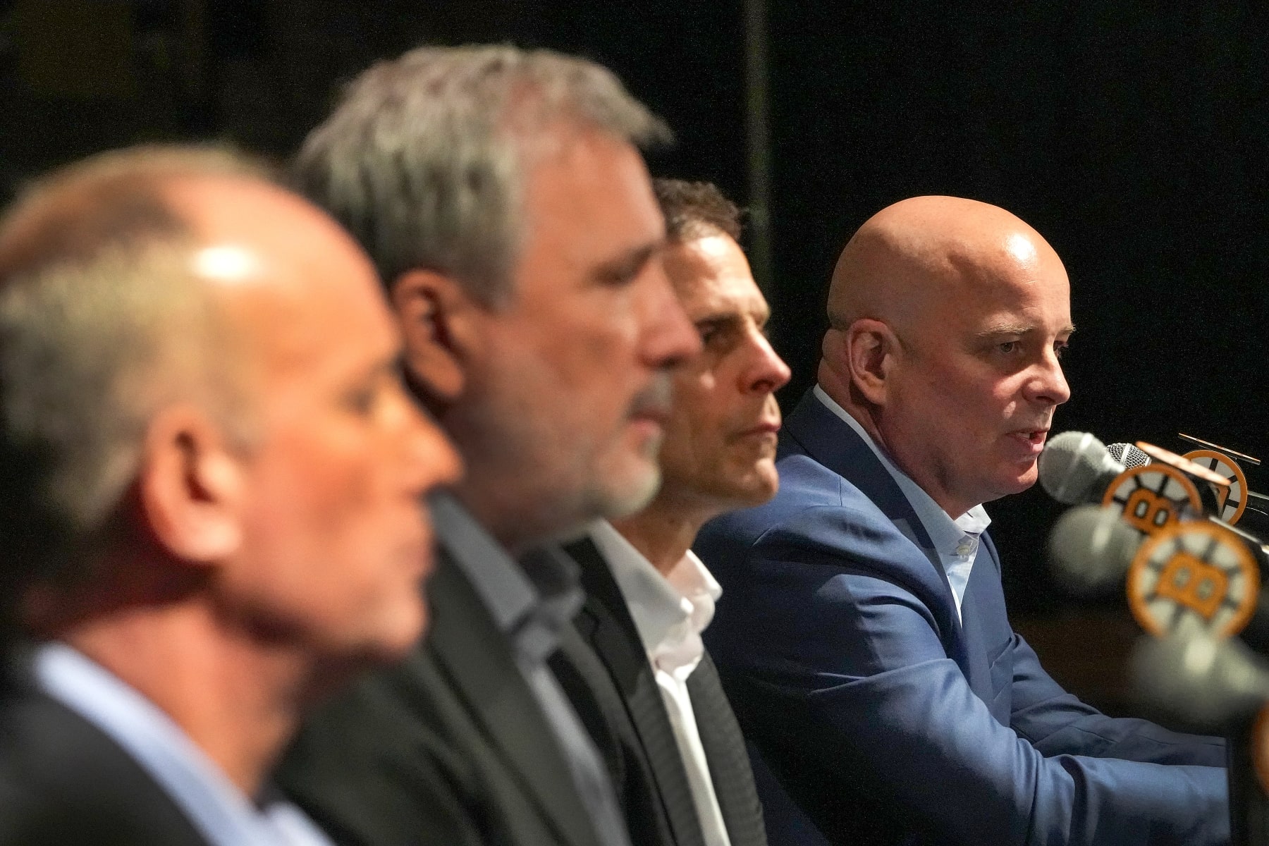 Boston, MA - May 22: From left, Charlie Jacobs, Chief Executive Officer of Delaware North and Chief Executive Officer and Alternate Governor for the Boston Bruins, Cam Neely, President, Don Sweeney, GM and Jim Montgomery, head coach during the team's end of season press conference at TD Garden. (Photo by Barry Chin/The Boston Globe via Getty Images)