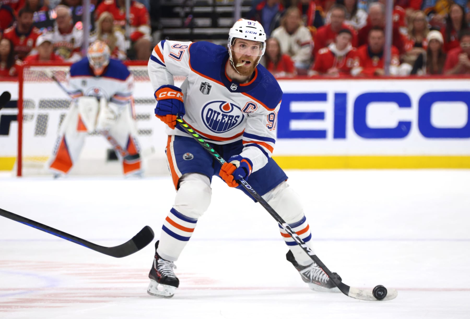 SUNRISE, FLORIDA - JUNE 18: Connor McDavid #97 of the Edmonton Oilers skates the puck through the neutral zone during the first period of Game Five of the 2024 Stanley Cup Final between the Edmonton Oilers and the Florida Panthers at Amerant Bank Arena on June 18, 2024 in Sunrise, Florida.  (Photo by Dave Sandford/NHLI via Getty Images)