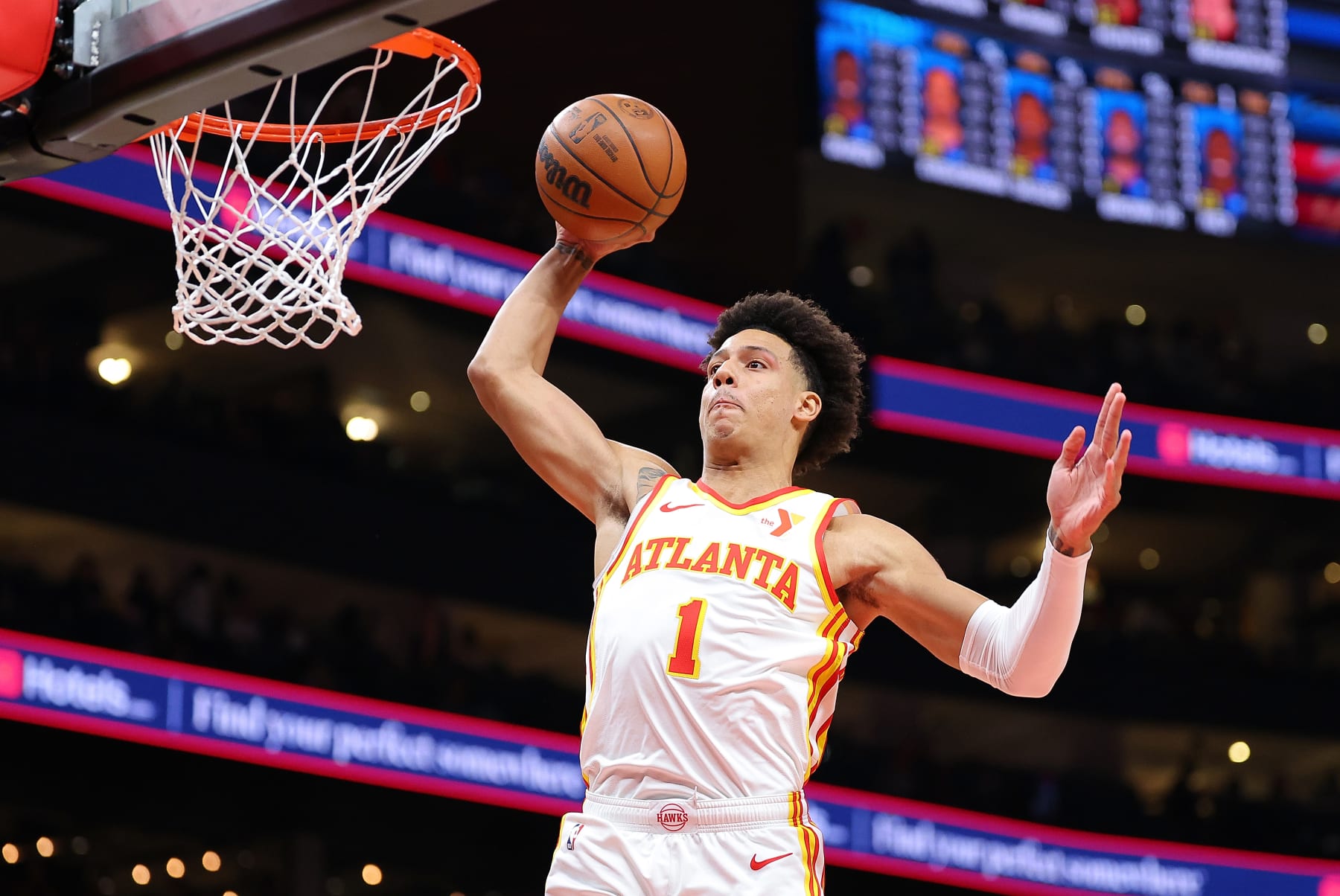ATLANTA, GEORGIA - APRIL 03:  Jalen Johnson #1 of the Atlanta Hawks dunks against the Detroit Pistons during the first quarter at State Farm Arena on April 03, 2024 in Atlanta, Georgia.  NOTE TO USER: User expressly acknowledges and agrees that, by downloading and/or using this photograph, user is consenting to the terms and conditions of the Getty Images License Agreement.  (Photo by Kevin C. Cox/Getty Images)