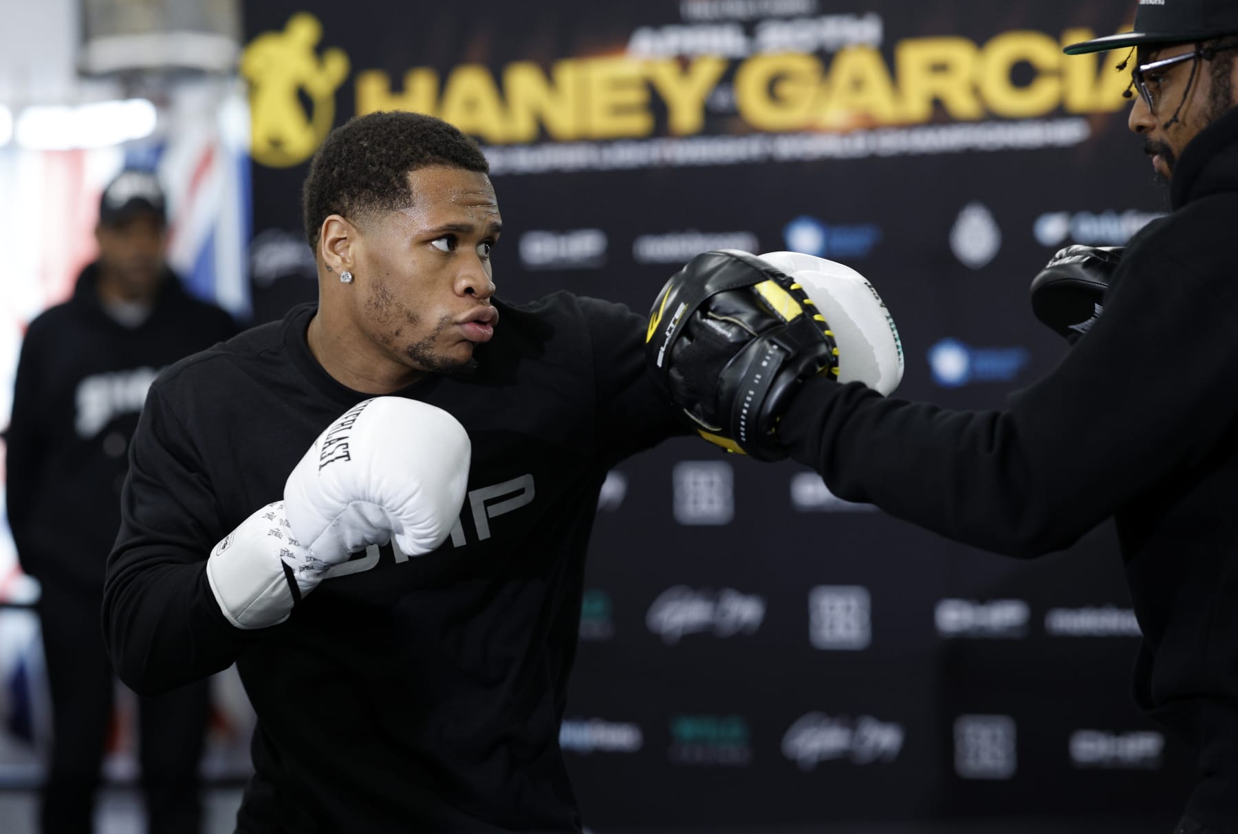LOS ANGELES, CALIFORNIA - APRIL 5: Devin Haney, the former undisputed lightweight champion and current WBC Super Lightweight Champion, throws a punch during a media workout at Wild Card Boxing Club to promote his upcoming title defense against Ryan Garcia on April 5, 2024 in Los Angeles, California. (Photo by Kevork Djansezian/Getty Images)