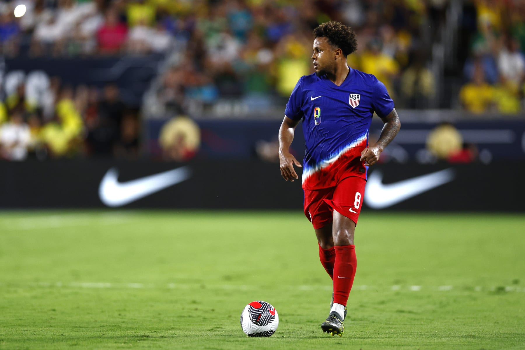 ORLANDO, FLORIDA - JUNE 12: Weston McKennie #8 of the United States scans the field during the second half against Brazil at Camping World Stadium on June 12, 2024 in Orlando, Florida. (Photo by Douglas Defelice/USSF/Getty Images for USSF)