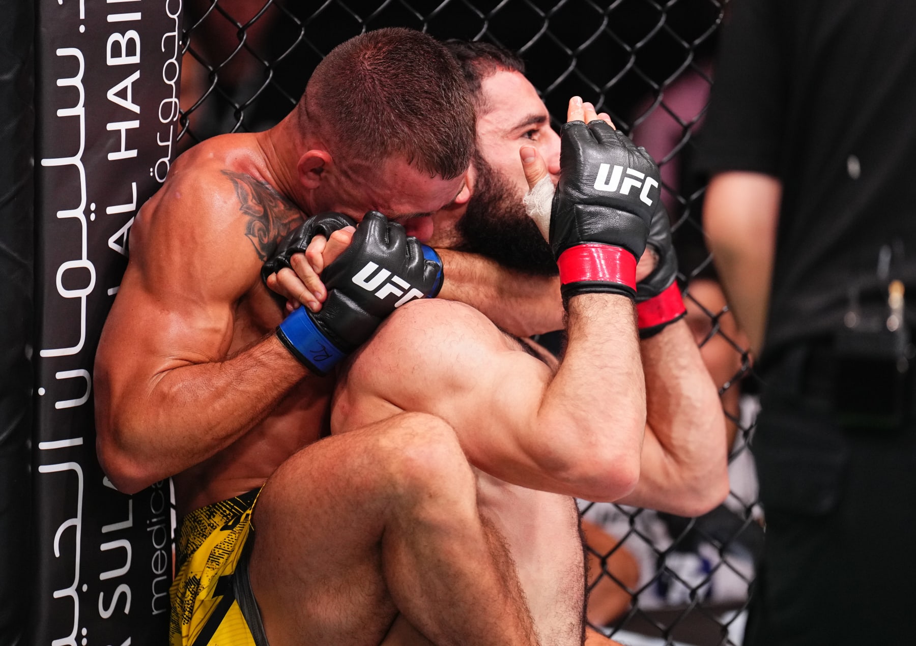 RIYADH, SAUDI ARABIA - JUNE 22: (L-R) Felipe Lima of Brazil secures a rear choke submission against Muhammad Naimov of Tajikistan in a featherweight fight during the UFC Fight Night event at Kingdom Arena on June 22, 2024 in Riyadh, Saudi Arabia. (Photo by Chris Unger/Zuffa LLC via Getty Images)