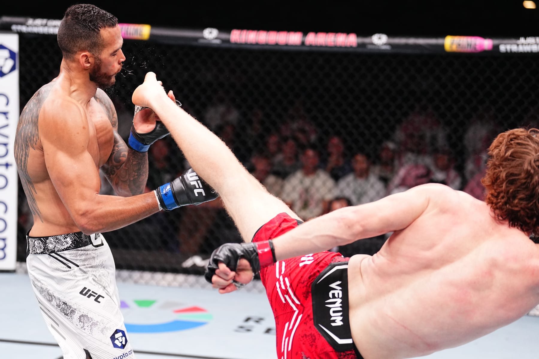 RIYADH, SAUDI ARABIA - JUNE 22: (R-L) Shara Magomedov of Russia kicks Antonio Trocoli of Brazil in a middleweight fight during the UFC Fight Night event at Kingdom Arena on June 22, 2024 in Riyadh, Saudi Arabia. (Photo by Chris Unger/Zuffa LLC via Getty Images)