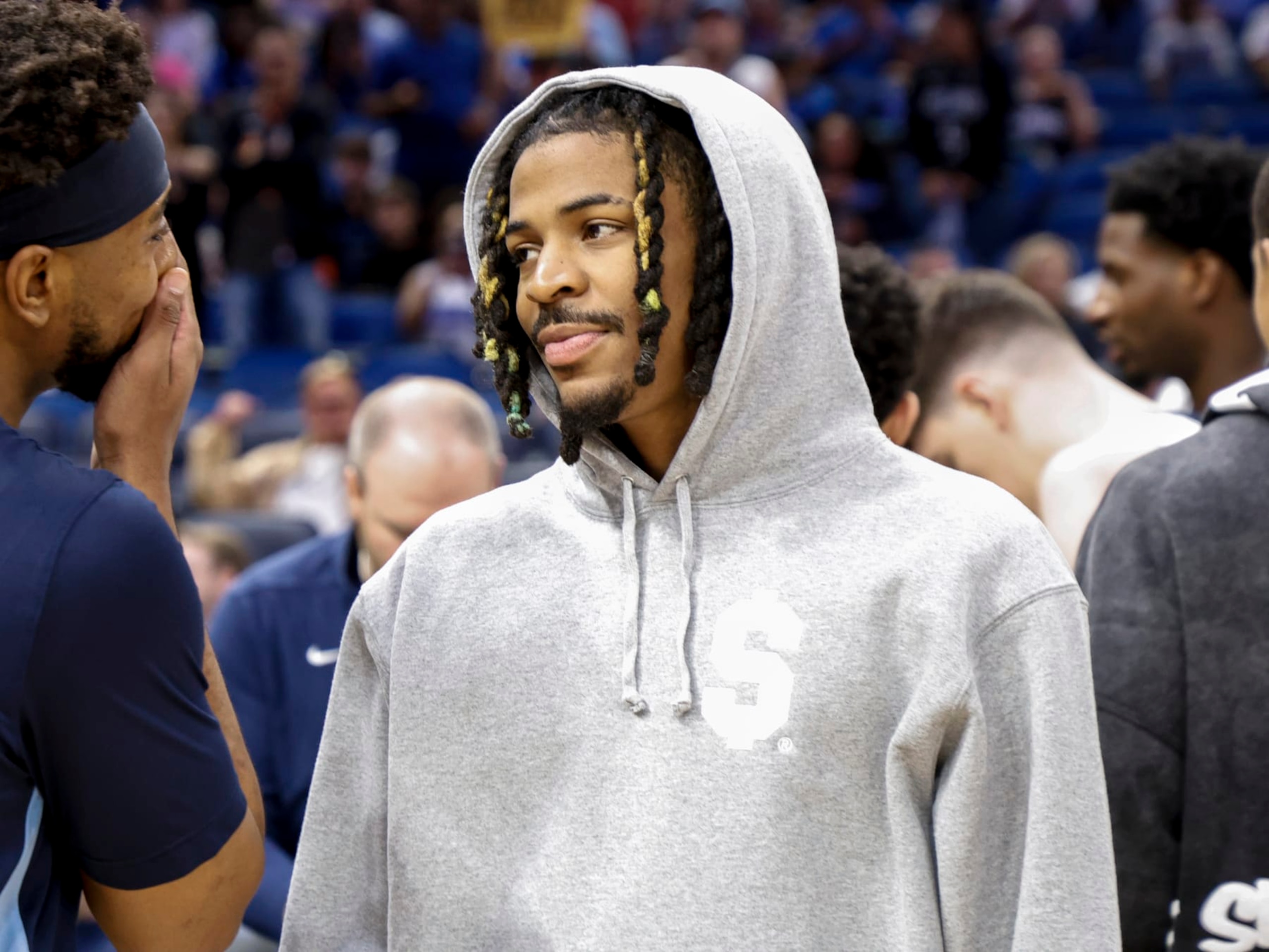 ORLANDO, FL - MARCH 30: Ja Morant #12 of the Memphis Grizzlies looks on during the game against the Orlando Magic at the Kia Center on March 30, 2024 in Orlando, Florida. The Magic defeated the Grizzlies 118-88. NOTE TO USER: User expressly acknowledges and agrees that, by downloading and or using this photograph, User is consenting to the terms and conditions of the Getty Images License Agreement. (Photo by Don Juan Moore/Getty Images)