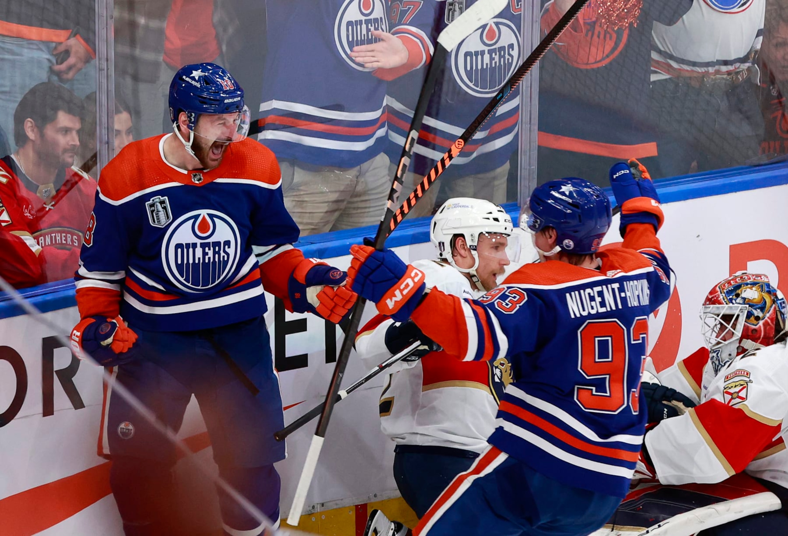 EDMONTON, ALBERTA - JUNE 21: Zach Hyman #18 of the Edmonton Oilers celebrates his goal with teammate Ryan Nugent-Hopkins #93 during Game Six of the 2024 Stanley Cup Final against the Florida Panthers at Rogers Place on June 21, 2024 in Edmonton, Alberta. Edmonton won 5-1. (Photo by Jeff Vinnick/Getty Images)