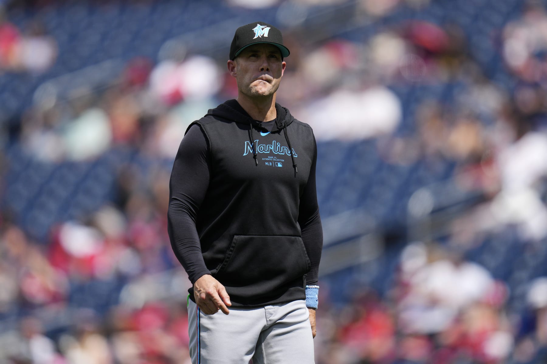 WASHINGTON, DC - JUNE 16: Skip Schumaker #45 of the Miami Marlins walks to the dugout after making a pitching change during the sixth inning against the Washington Nationals at Nationals Park on June 16, 2024 in Washington, DC. (Photo by Jess Rapfogel/Getty Images)