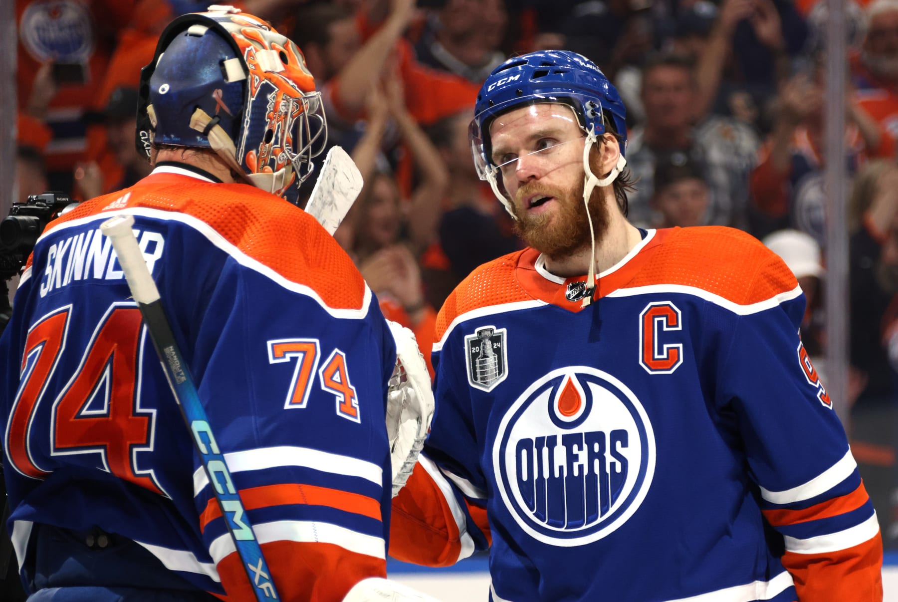 EDMONTON, ALBERTA - JUNE 21: Goaltender Stuart Skinner #74 and Connor McDavid #97 of the Edmonton Oilers celebrate after Game Six of the 2024 Stanley Cup Final between Florida Panthers and the Edmonton Oilers at Rogers Place on June 21, 2024 in Edmonton, Alberta. (Photo by Dave Sandford/NHLI via Getty Images)