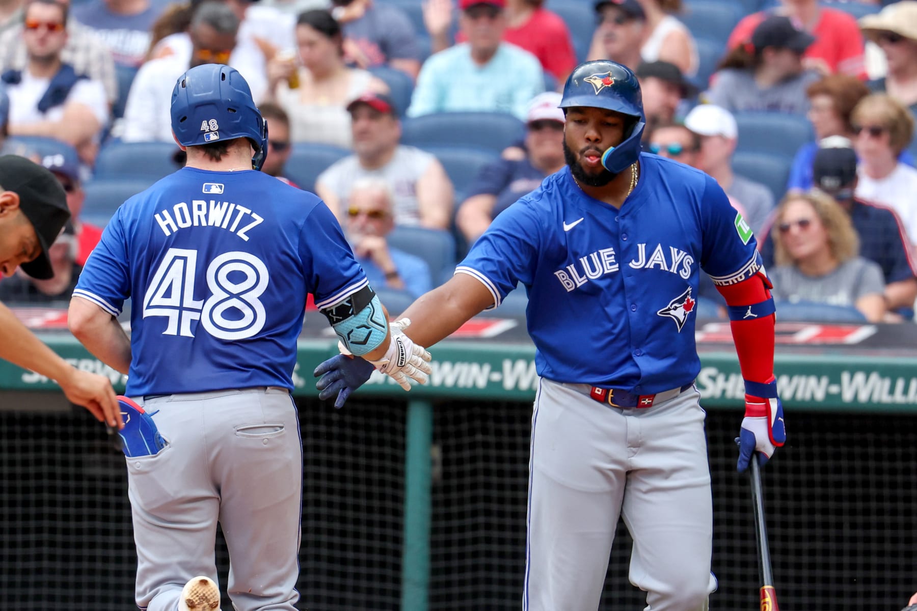 CLEVELAND, OH - JUNE 23: Toronto Blue Jays second baseman Spencer Horwitz (48) is congratulated by Toronto Blue Jays first baseman Vladimir Guerrero Jr. (27) after hitting a home run during the third inning of the Major League Baseball game between the Toronto Blue Jays and Cleveland Guardians on June 23, 2024, at Progressive Field in Cleveland, OH. (Photo by Frank Jansky/Icon Sportswire via Getty Images)