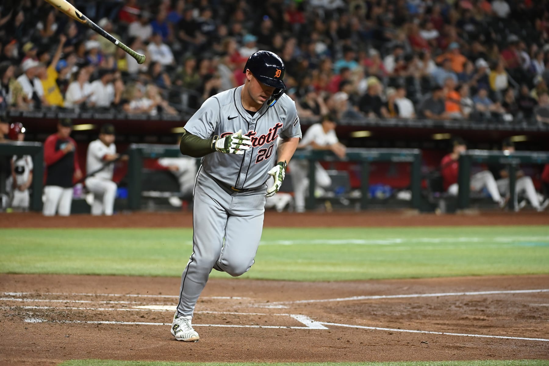 PHOENIX, ARIZONA - MAY 19: Spencer Torkelson #20 of the Detroit Tigers tosses his bat after hitting a solo home run against the Arizona Diamondbacks during the third inning at Chase Field on May 19, 2024 in Phoenix, Arizona. (Photo by Norm Hall/Getty Images)