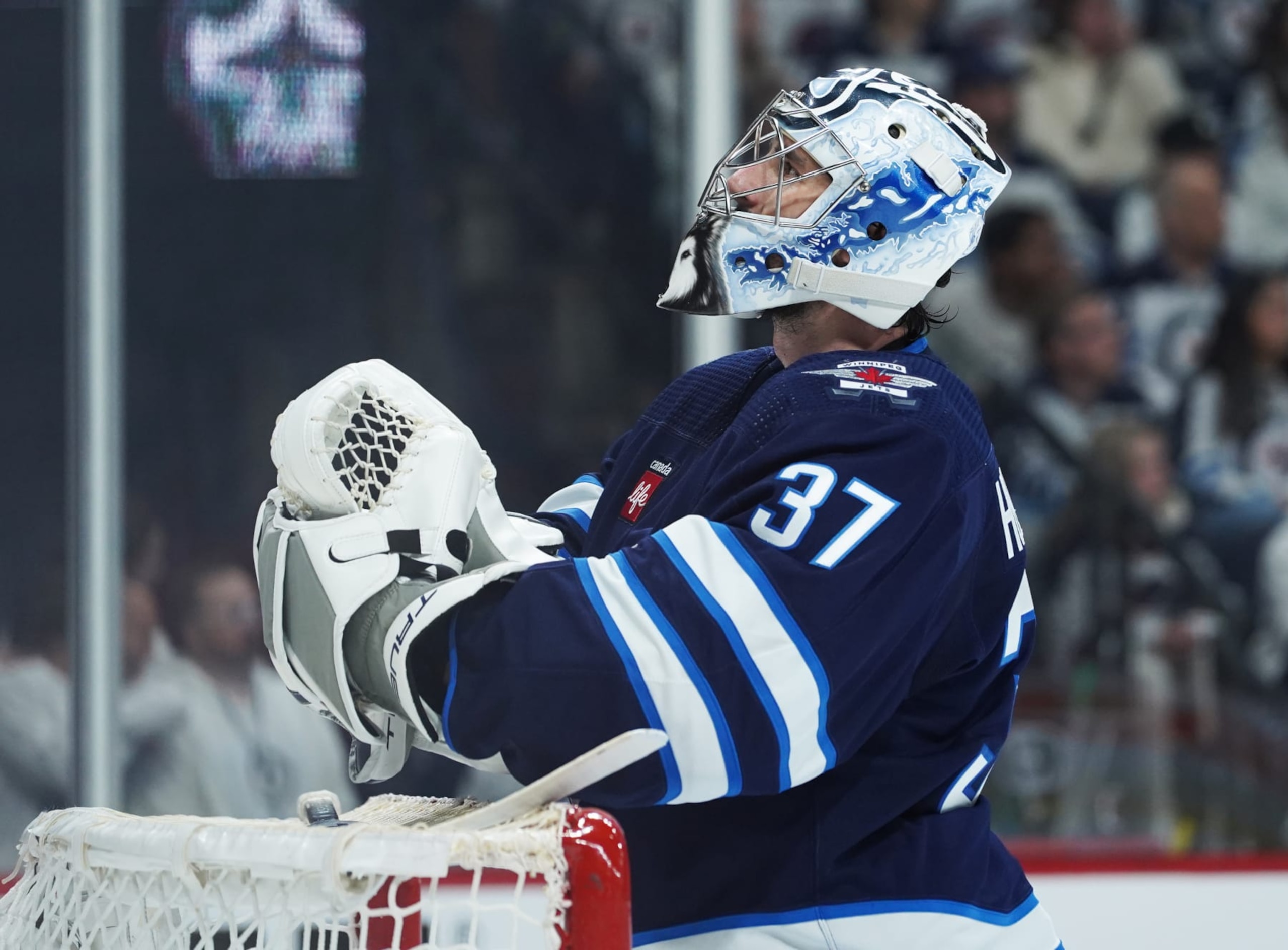 WINNIPEG, CANADA - APRIL 30: Connor Hellebuyck #37 of the Winnipeg Jets as the team faces the Colorado Avalanche in Game Five of the First Round of the 2024 Stanley Cup Playoffs at Canada Life Centre on April 30, 2024, in Winnipeg, Canada. (Photo by David Lipnowski/Getty Images)