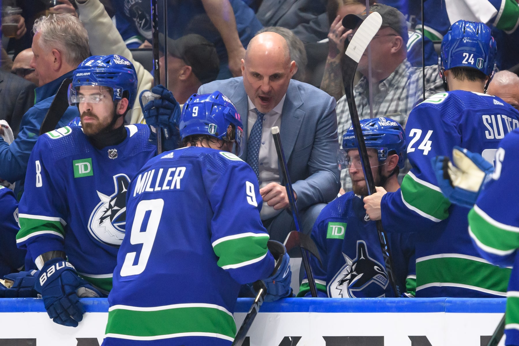 VANCOUVER, CANADA - MAY 8: Vancouver Canucks head coach Rick Tocchet talks to J.T. Miller #9 during the third period in Game One of the Second Round of the 2024 Stanley Cup Playoffs against the Edmonton Oilers at Rogers Arena on May 8, 2024 in Vancouver, British Columbia, Canada. (Photo by Derek Cain/Getty Images)