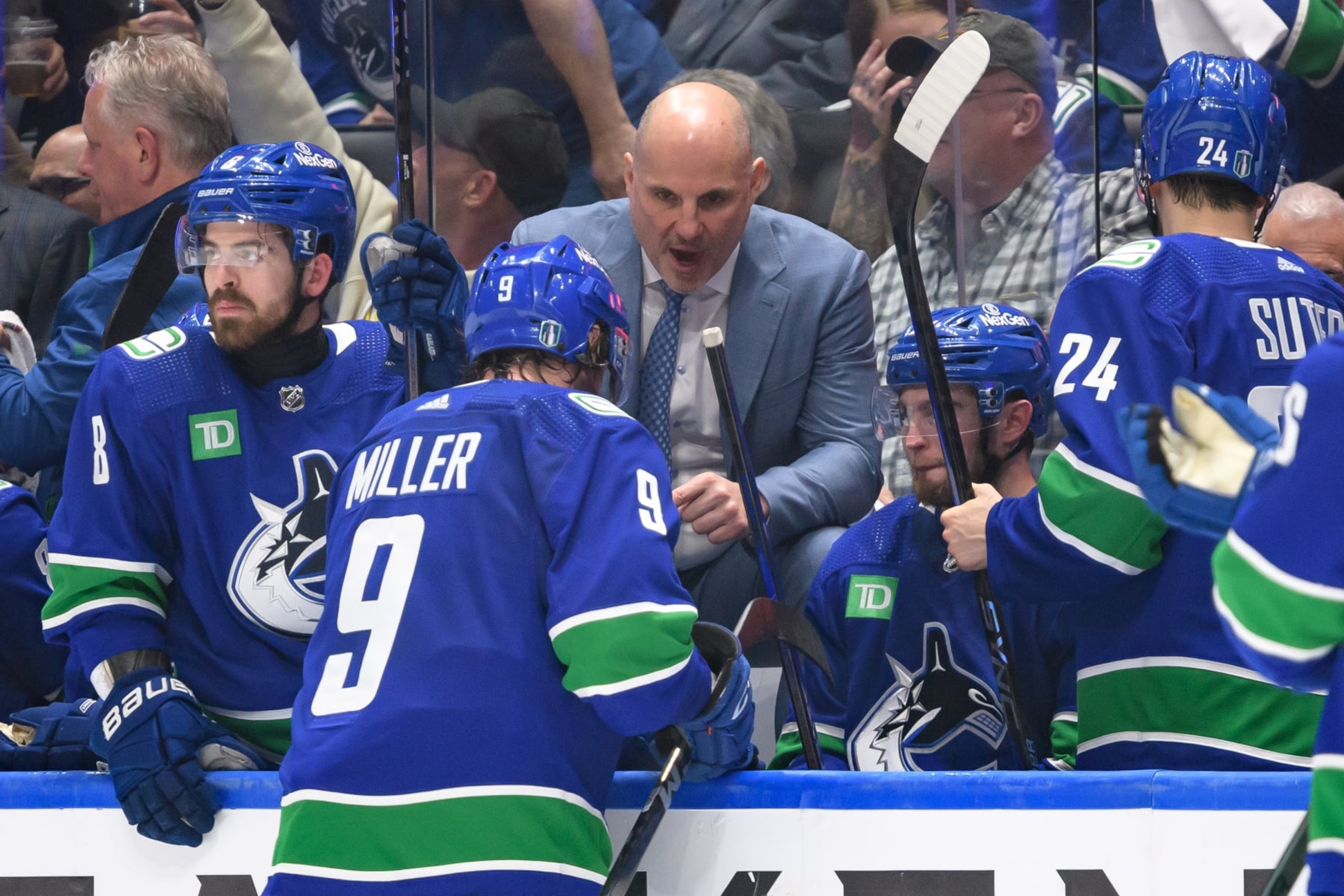 VANCOUVER, CANADA - MAY 8: Vancouver Canucks head coach Rick Tocchet talks to J.T. Miller #9 during the third period in Game One of the Second Round of the 2024 Stanley Cup Playoffs against the Edmonton Oilers at Rogers Arena on May 8, 2024 in Vancouver, British Columbia, Canada. (Photo by Derek Cain/Getty Images)