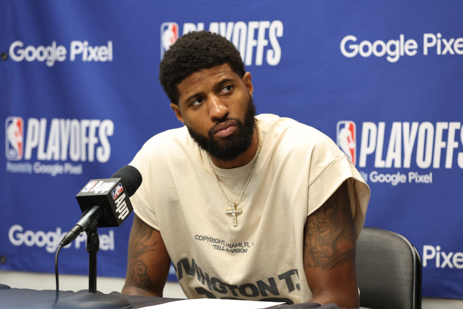 DALLAS, TX - APRIL 28: Paul George #13 of the LA Clippers talks to the media after the game against the Dallas Mavericks during Round 1 Game 4 of the 2024 NBA Playoffs on April 28, 2024 at the American Airlines Center in Dallas, Texas. NOTE TO USER: User expressly acknowledges and agrees that, by downloading and or using this photograph, User is consenting to the terms and conditions of the Getty Images License Agreement. Mandatory Copyright Notice: Copyright 2024 NBAE (Photo by Tim Heitman/NBAE via Getty Images)