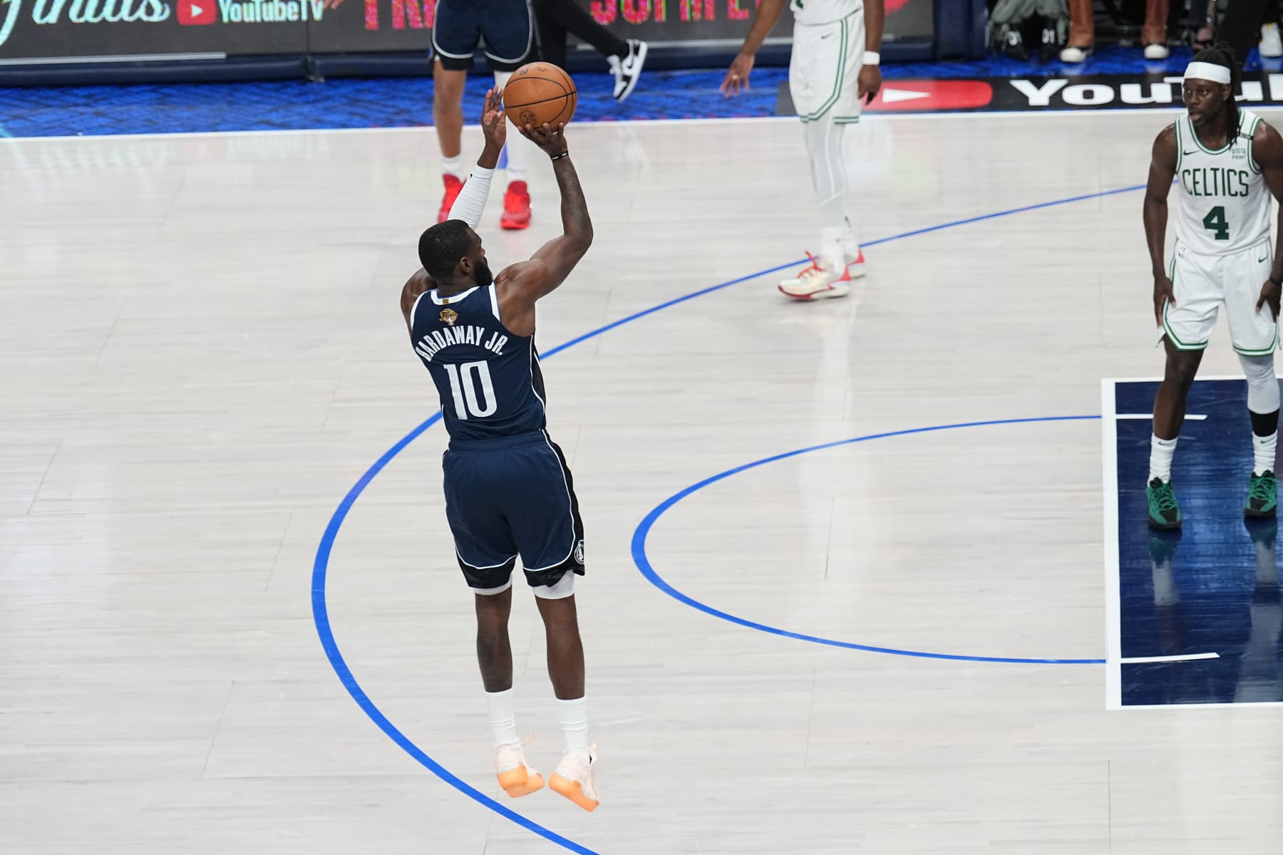 DALLAS, TX - JUNE 12: Tim Hardaway Jr. #10 of the Dallas Mavericks shoots a three point basket during the game against the Boston Celtics during Game Three of the 2024 NBA Finals on June 12, 2024 at the American Airlines Center in Dallas, Texas. NOTE TO USER: User expressly acknowledges and agrees that, by downloading and or using this photograph, User is consenting to the terms and conditions of the Getty Images License Agreement. Mandatory Copyright Notice: Copyright 2024 NBAE (Photo by Glenn James/NBAE via Getty Images)