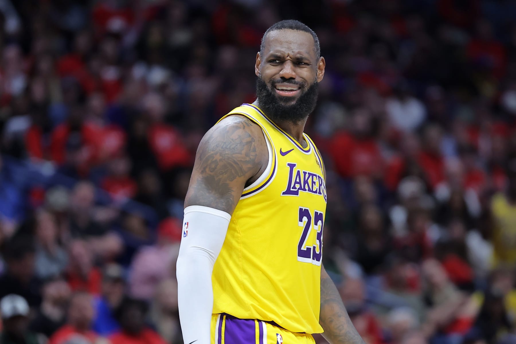 NEW ORLEANS, LOUISIANA - APRIL 16: LeBron James #23 of the Los Angeles Lakers reacts against the New Orleans Pelicans during a play-in tournament game at the Smoothie King Center on April 16, 2024 in New Orleans, Louisiana. NOTE TO USER: User expressly acknowledges and agrees that, by downloading and or using this Photograph, user is consenting to the terms and conditions of the Getty Images License Agreement. (Photo by Jonathan Bachman/Getty Images)