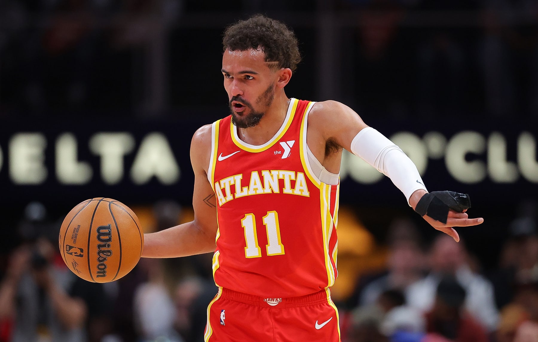 ATLANTA, GEORGIA - APRIL 10:  Trae Young #11 of the Atlanta Hawks runs the offense against the Charlotte Hornets during the second quarter at State Farm Arena on April 10, 2024 in Atlanta, Georgia.  NOTE TO USER: User expressly acknowledges and agrees that, by downloading and/or using this photograph, user is consenting to the terms and conditions of the Getty Images License Agreement.  (Photo by Kevin C. Cox/Getty Images)