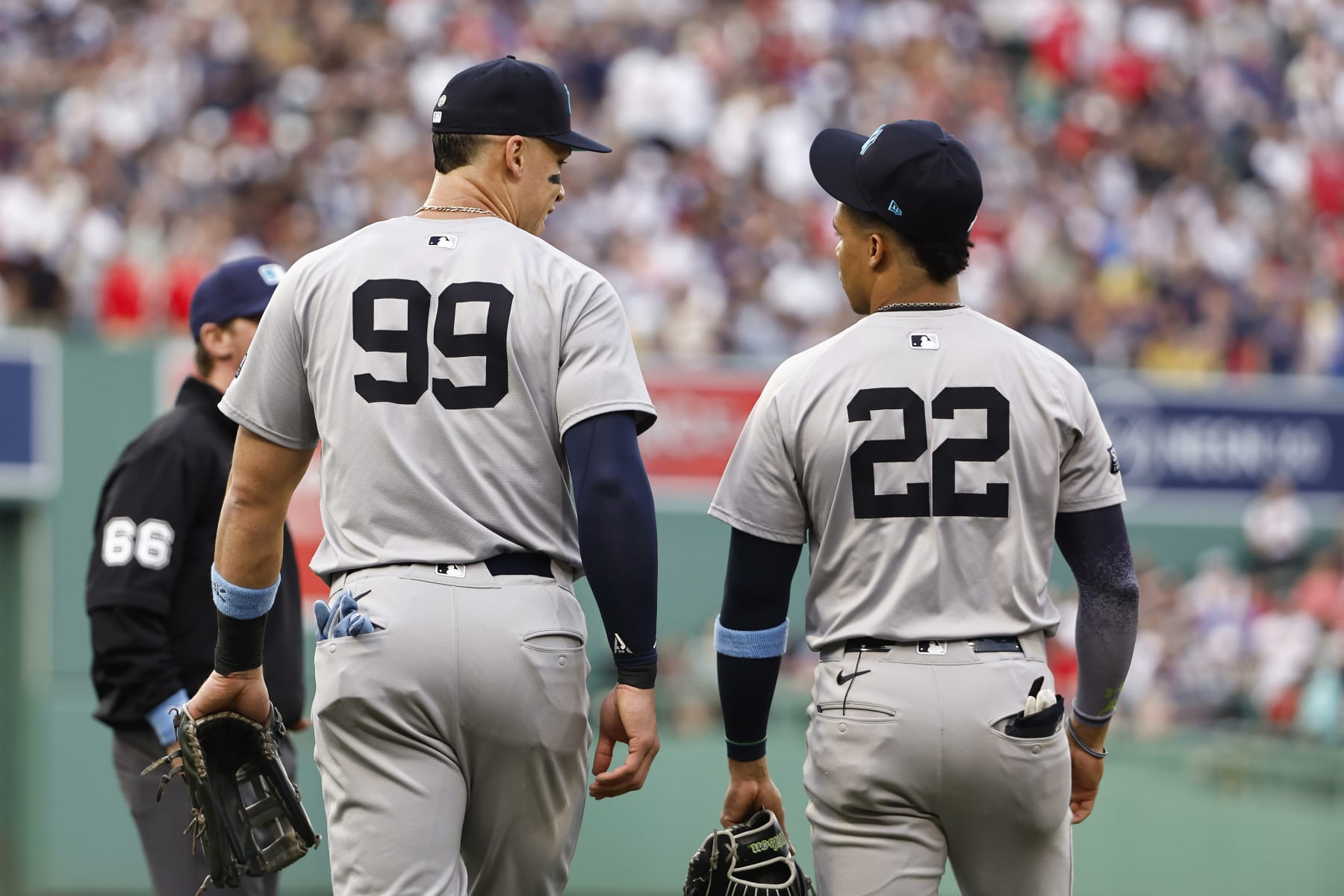 BOSTON, MA - JUNE 16: Aaron Judge #99 of the New York Yankees and Juan Soto #22 talk as they head to the field during the first inning against the Boston Red Sox at Fenway Park on June 16, 2024 in Boston, Massachusetts. (Photo By Winslow Townson/Getty Images)