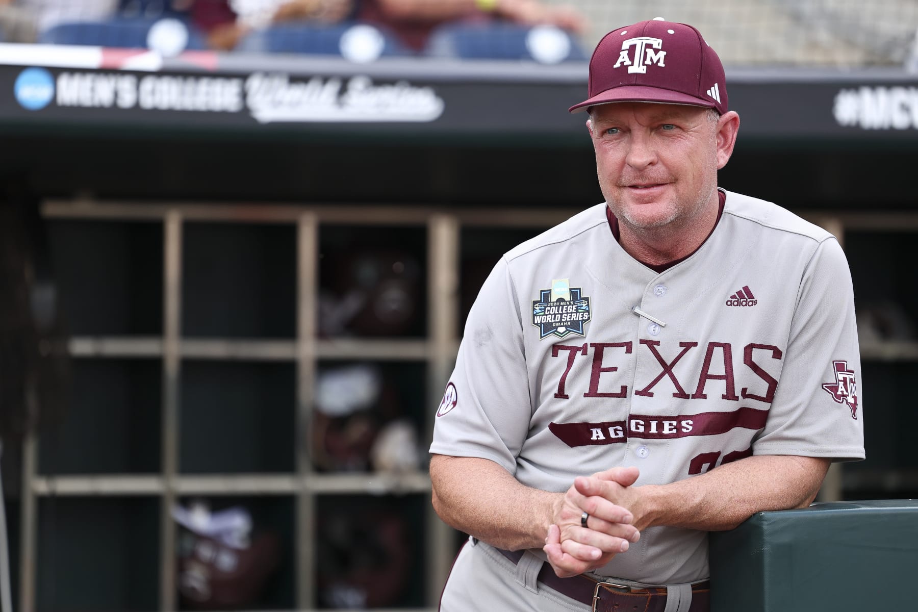 OMAHA, NEBRASKA - JUNE 22: Head coach Jim Schlossnagle of the Texas A&M Aggies looks on before the game against the Tennessee Volunteers during the Division I Men's Baseball Championship held at Charles Schwab Field on June 22, 2024 in Omaha, Nebraska.  (Photo by C. Morgan Engel/NCAA Photos via Getty Images)
