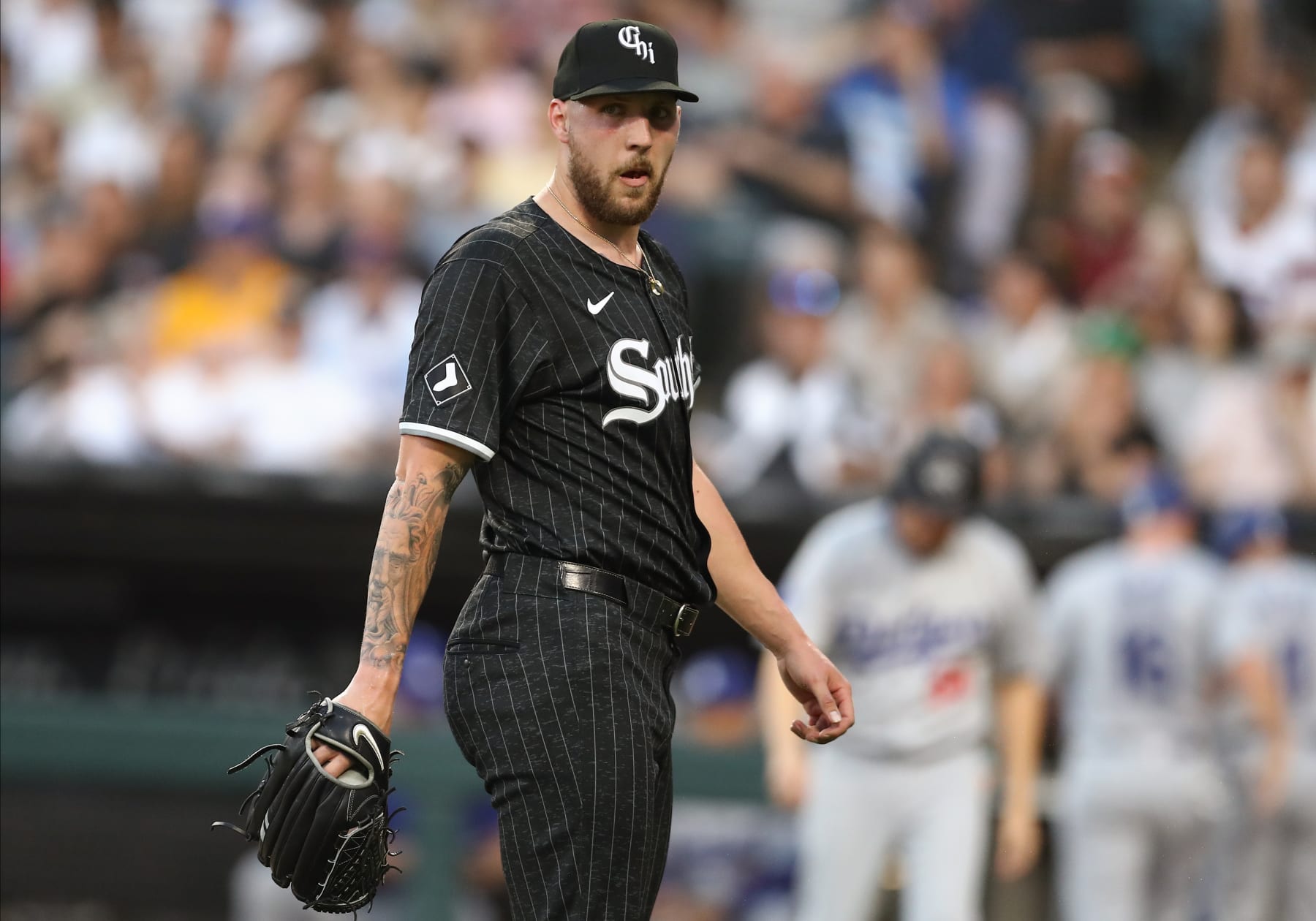 CHICAGO, IL - JUNE 24: Garrett Crochet #45 of the Chicago White Sox looks on as he walks back to the dugout after the final out in the during the third inning against the Los Angeles Dodgers on June 24, 2024 at Guaranteed Rate Field in Chicago,Illinois. (Photo by Melissa Tamez/Icon Sportswire via Getty Images)