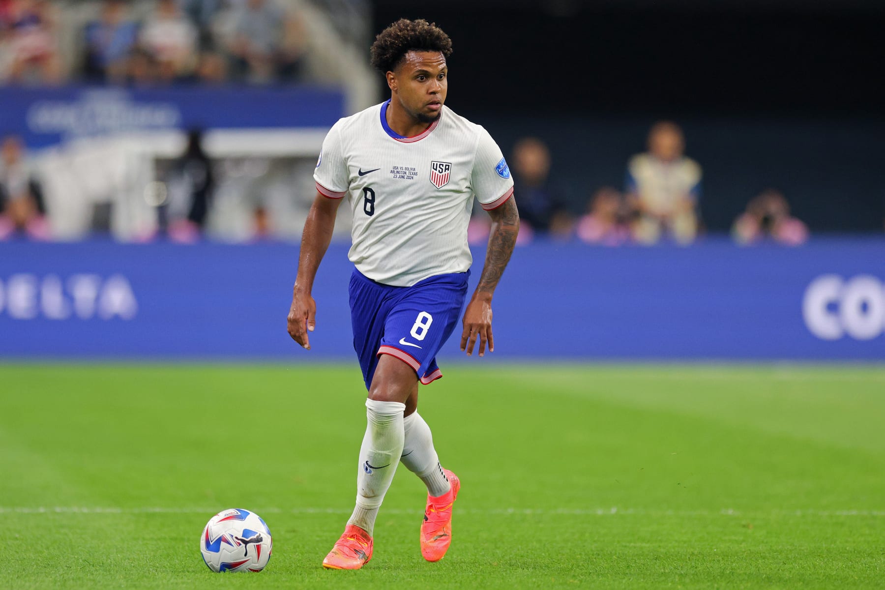 ARLINGTON, TEXAS - JUNE 23: Weston McKennie #8 of the United States looks around during the second half against Bolivia at AT&T Stadium on June 23, 2024 in Arlington, Texas. (Photo by John Dorton/ISI Photos/USSF/Getty Images for USSF)