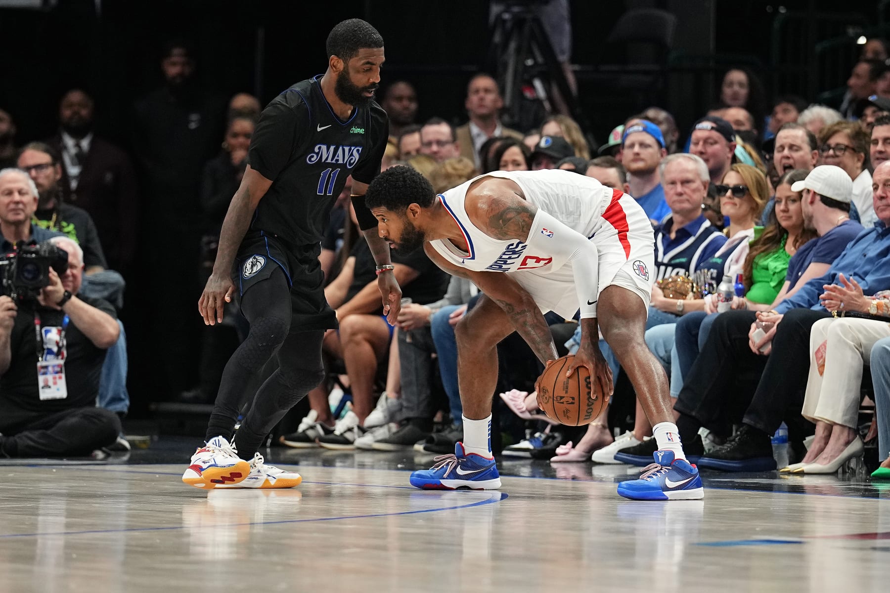 DALLAS, TX - MAY 3: Paul George #13 of the LA Clippers handles the ball during the game against the Dallas Mavericks during Round 1 Game 6 of the 2024 NBA Playoffs on May 3, 2024 at the American Airlines Center in Dallas, Texas. NOTE TO USER: User expressly acknowledges and agrees that, by downloading and or using this photograph, User is consenting to the terms and conditions of the Getty Images License Agreement. Mandatory Copyright Notice: Copyright 2024 NBAE (Photo by Glenn James/NBAE via Getty Images)