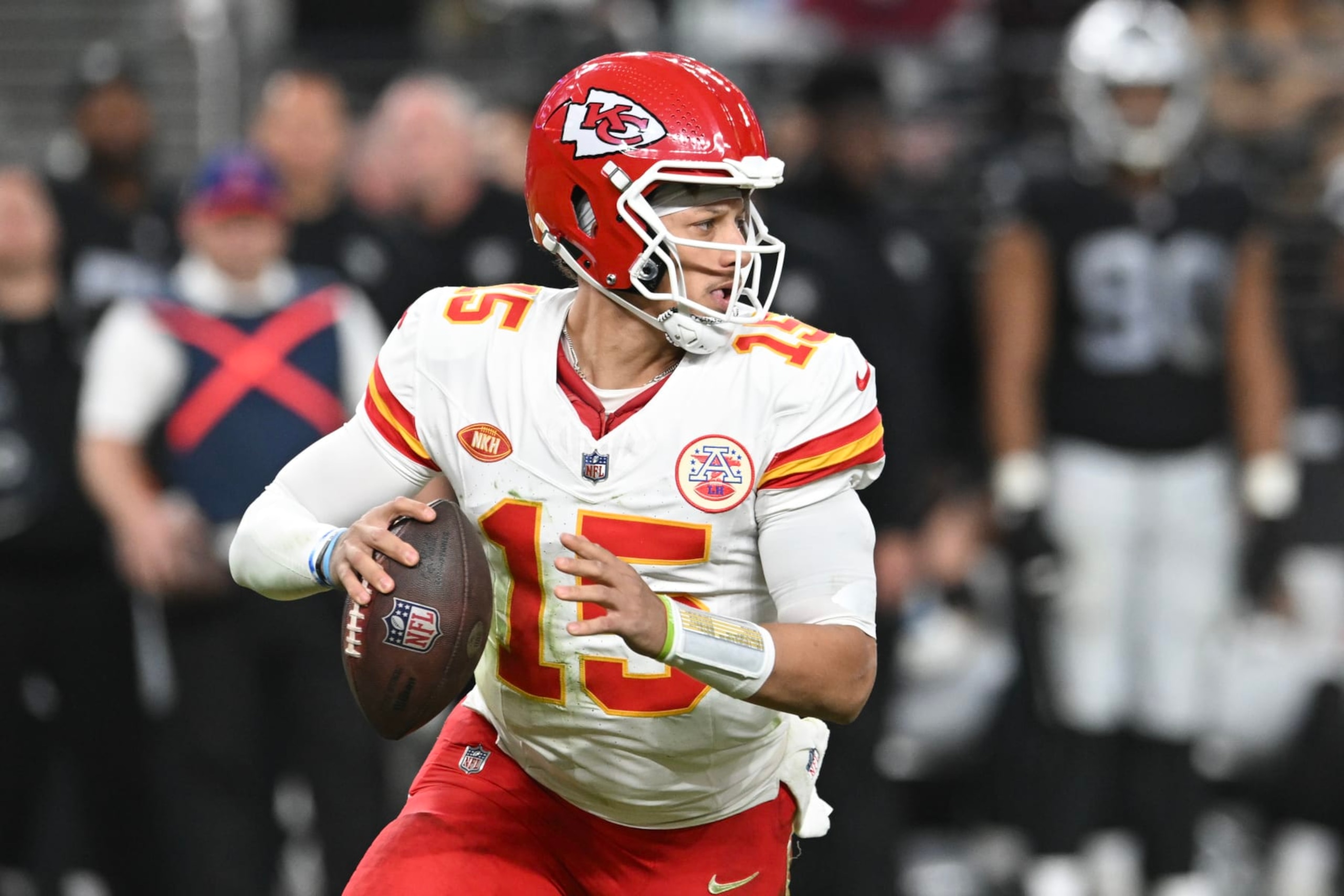 LAS VEGAS, NEVADA - NOVEMBER 26: Quarterback Patrick Mahomes #15 of the Kansas City Chiefs looks to make a pass against the Las Vegas Raiders in the fourth quarter at Allegiant Stadium on November 26, 2023 in Las Vegas, Nevada. The Chiefs defeated the Raiders 31-17. (Photo by Candice Ward/Getty Images)