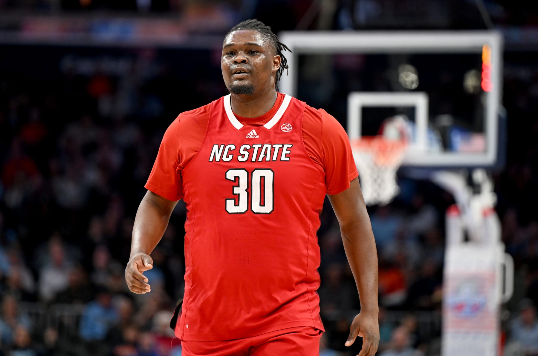 WASHINGTON, DC - MARCH 15: DJ Burns Jr. #30 of the North Carolina State Wolfpack walks down the court during the game against the Virginia Cavaliers in the Semifinals of the ACC Men's Basketball Tournament at Capital One Arena on March 15, 2024 in Washington, DC.  (Photo by Greg Fiume/Getty Images)