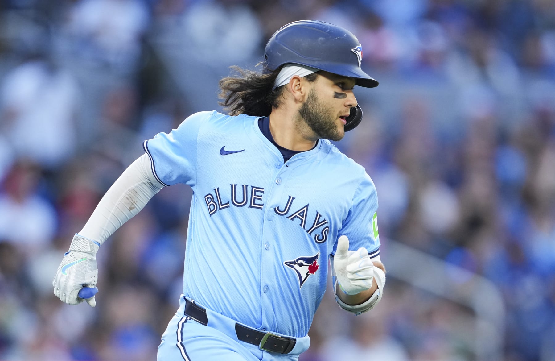 TORONTO, ON - JUNE 14: Bo Bichette #11 of Toronto Blue Jays runs to first base against the Cleveland Guardians during the fourth inning in their MLB game at the Rogers Centre on June 14, 2024 in Toronto, Ontario, Canada. (Photo by Mark Blinch/Getty Images)