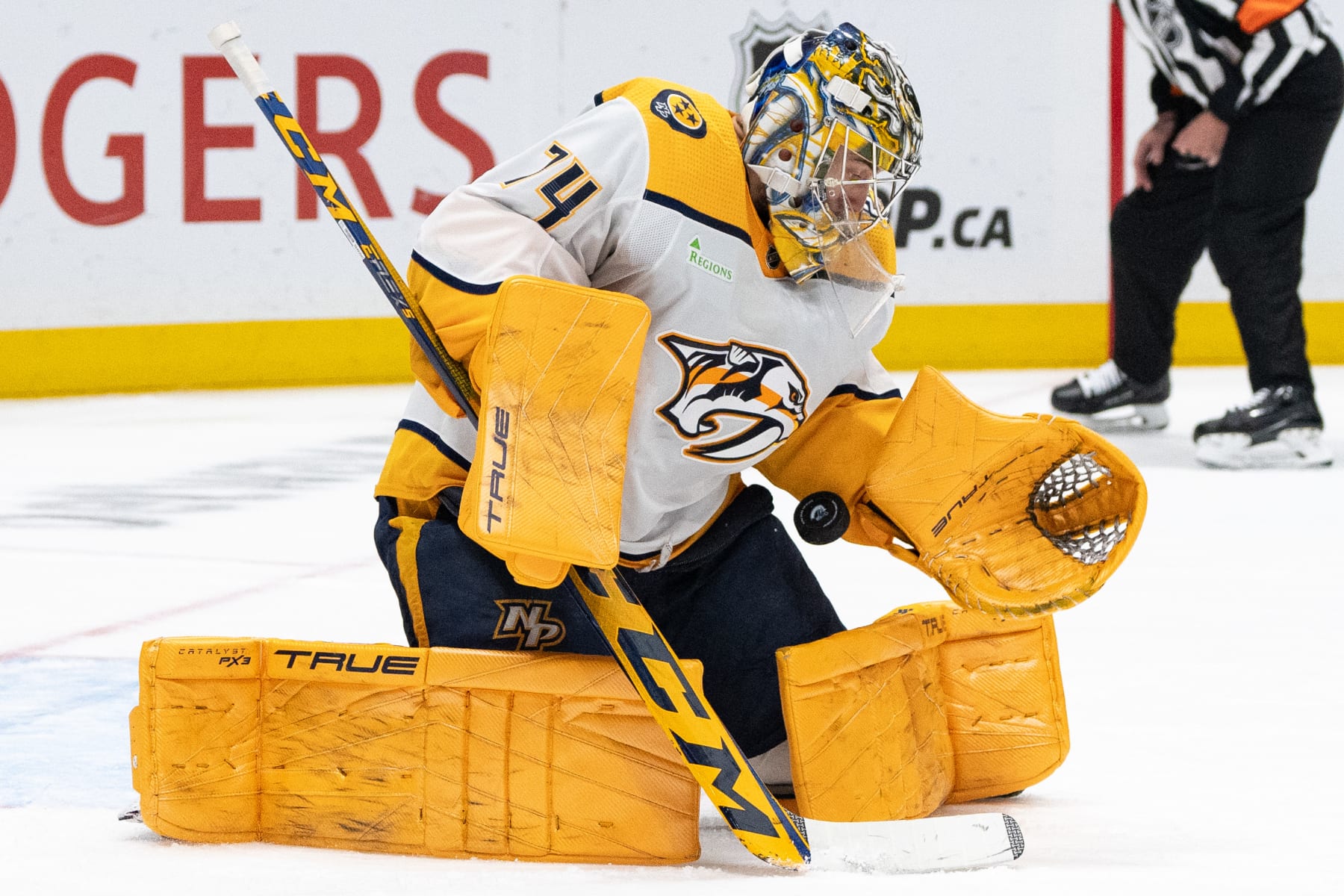 VANCOUVER, BC - APRIL 30: Nashville Predators goaltender Juuse Saros (74) stops the puck during Game Five of the First Round of the 2024 Stanley Cup playoffs between the Nashville Predators and the Vancouver Canucks on April 30, 2024, at Rogers Arena in Vancouver, B.C. (Photo by Ethan Cairns/Icon Sportswire via Getty Images)