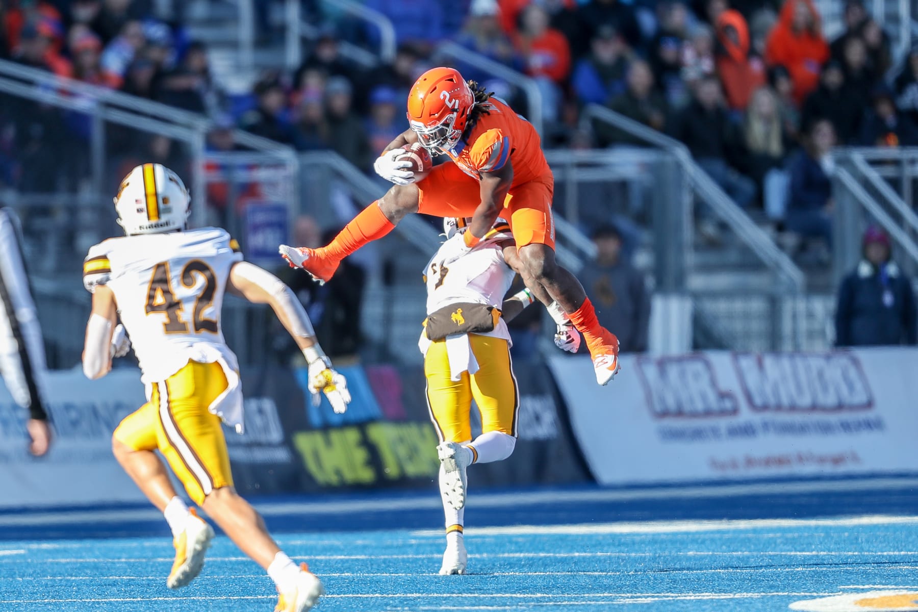 BOISE, ID - OCTOBER 28: Running back Ashton Jeanty #2 of the Boise State Broncos hurdles over corner back Jakorey Hawkins #7 of the Wyoming Cowboys during the first half at Albertsons Stadium on October 28, 2023 in Boise, Idaho. (Photo by Loren Orr/Getty Images)