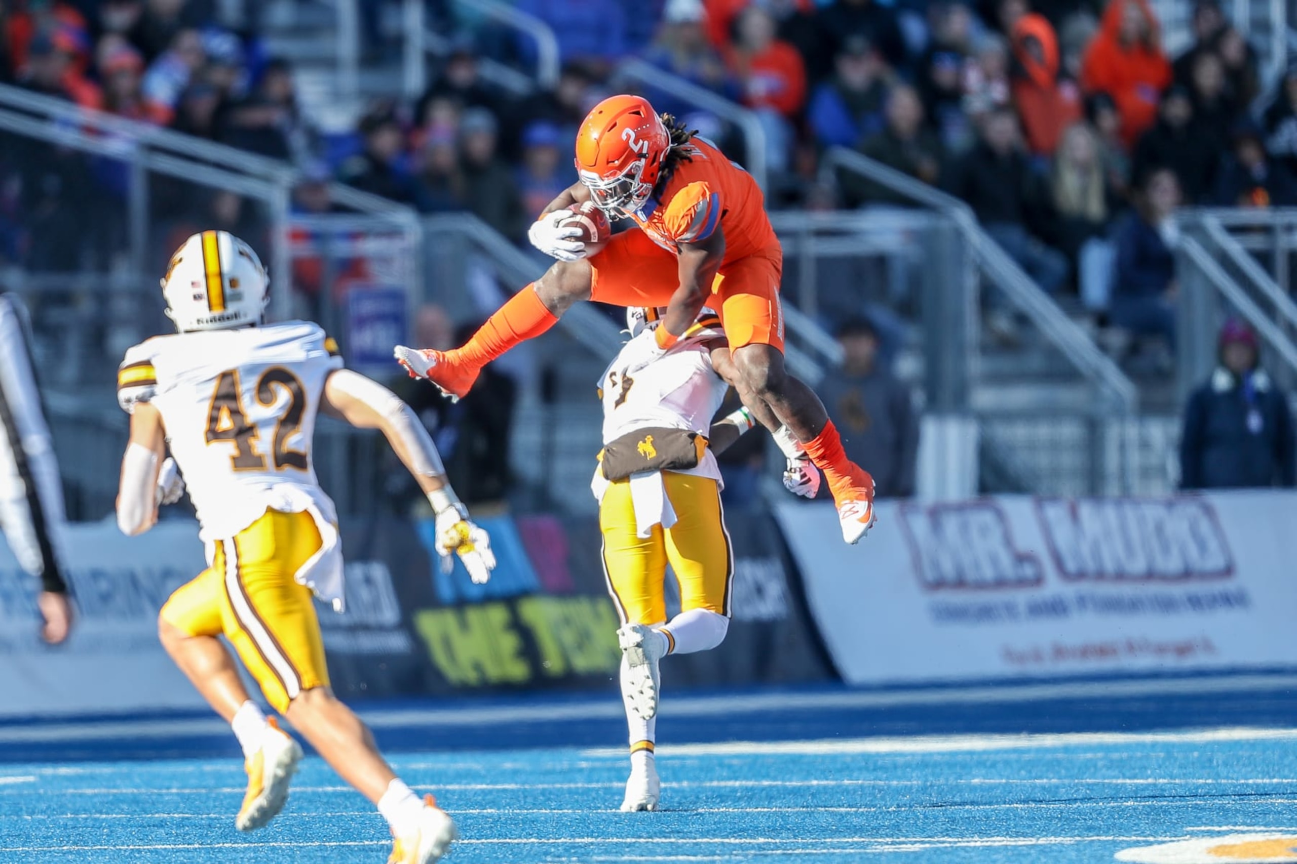BOISE, ID - OCTOBER 28: Running back Ashton Jeanty #2 of the Boise State Broncos hurdles over corner back Jakorey Hawkins #7 of the Wyoming Cowboys during the first half at Albertsons Stadium on October 28, 2023 in Boise, Idaho. (Photo by Loren Orr/Getty Images) BOISE, ID - OCTOBER 28: Running back Ashton Jeanty #2 of the Boise State Broncos hurdles over corner back Jakorey Hawkins #7 of the Wyoming Cowboys during the first half at Albertsons Stadium on October 28, 2023 in Boise, Idaho. (Photo by Loren Orr/Getty Images)