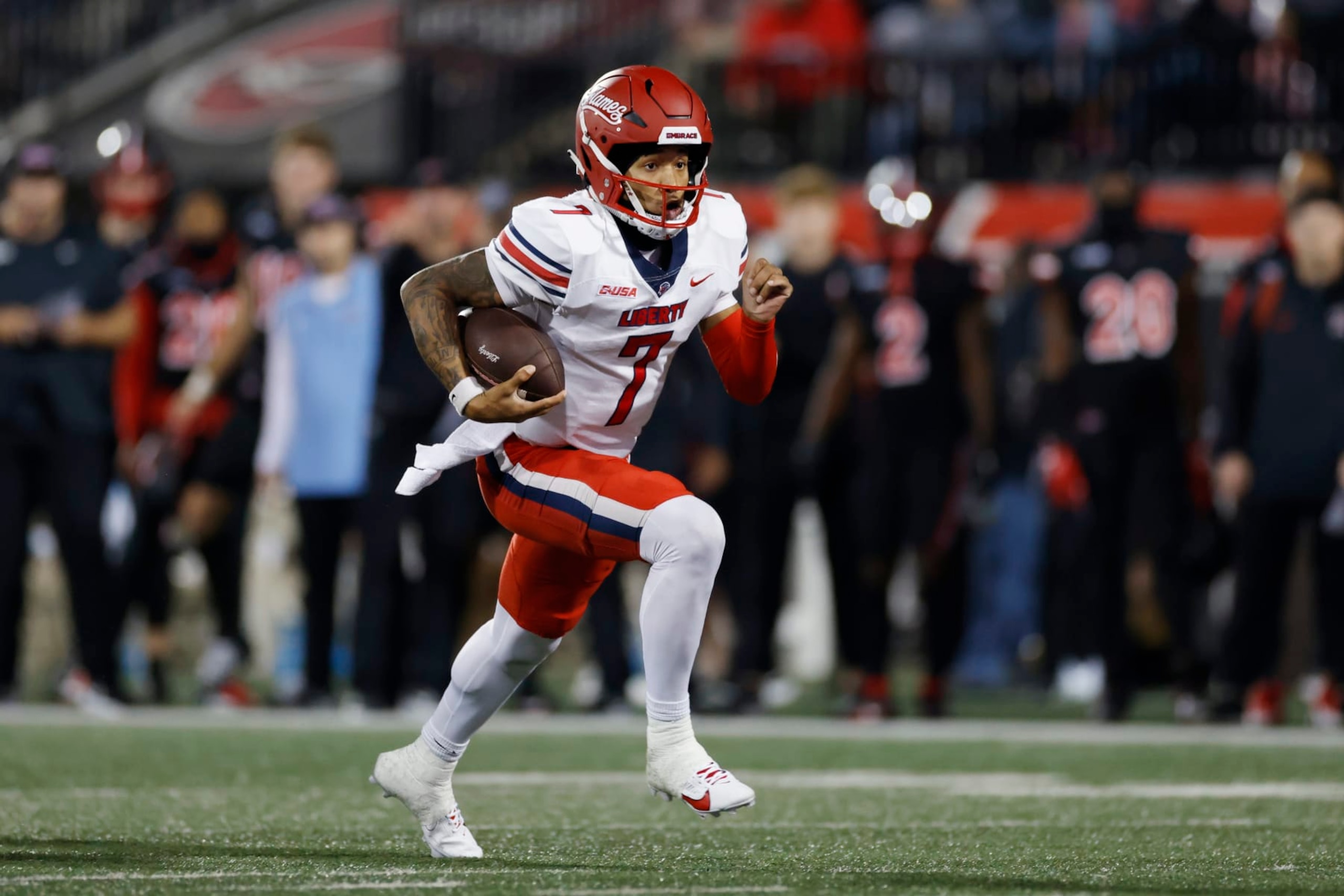 BOWLING GREEN, KY - OCTOBER 24: Liberty Flames quarterback Kaidon Salter (7) runs with the ball during a college football game against the Western Kentucky Hilltoppers on October 24, 2023 at Houchens Industries - L. T. Smith Stadium in Bowling Green, Kentucky. (Photo by Joe Robbins/Icon Sportswire via Getty Images) BOWLING GREEN, KY - OCTOBER 24: Liberty Flames quarterback Kaidon Salter (7) runs with the ball during a college football game against the Western Kentucky Hilltoppers on October 24, 2023 at Houchens Industries - L. T. Smith Stadium in Bowling Green, Kentucky. (Photo by Joe Robbins/Icon Sportswire via Getty Images)