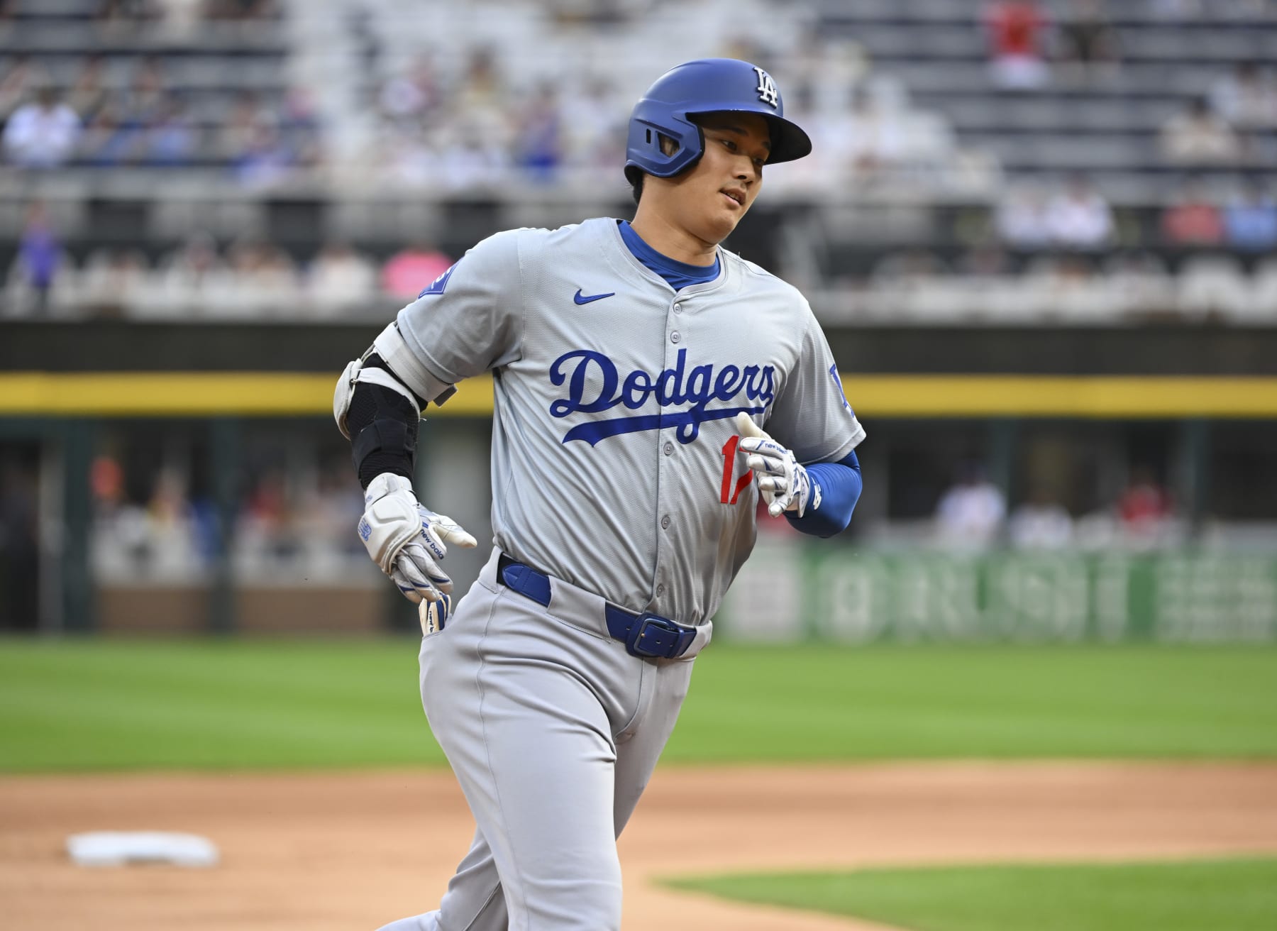 CHICAGO, ILLINOIS - JUNE 25: Shohei Ohtani #17 of the Los Angeles Dodgers hits a home run during the first inning of a game against the Chicago White Sox at Guaranteed Rate Field on June 25, 2024 in Chicago, Illinois. (Photo by Nuccio DiNuzzo/Getty Images)