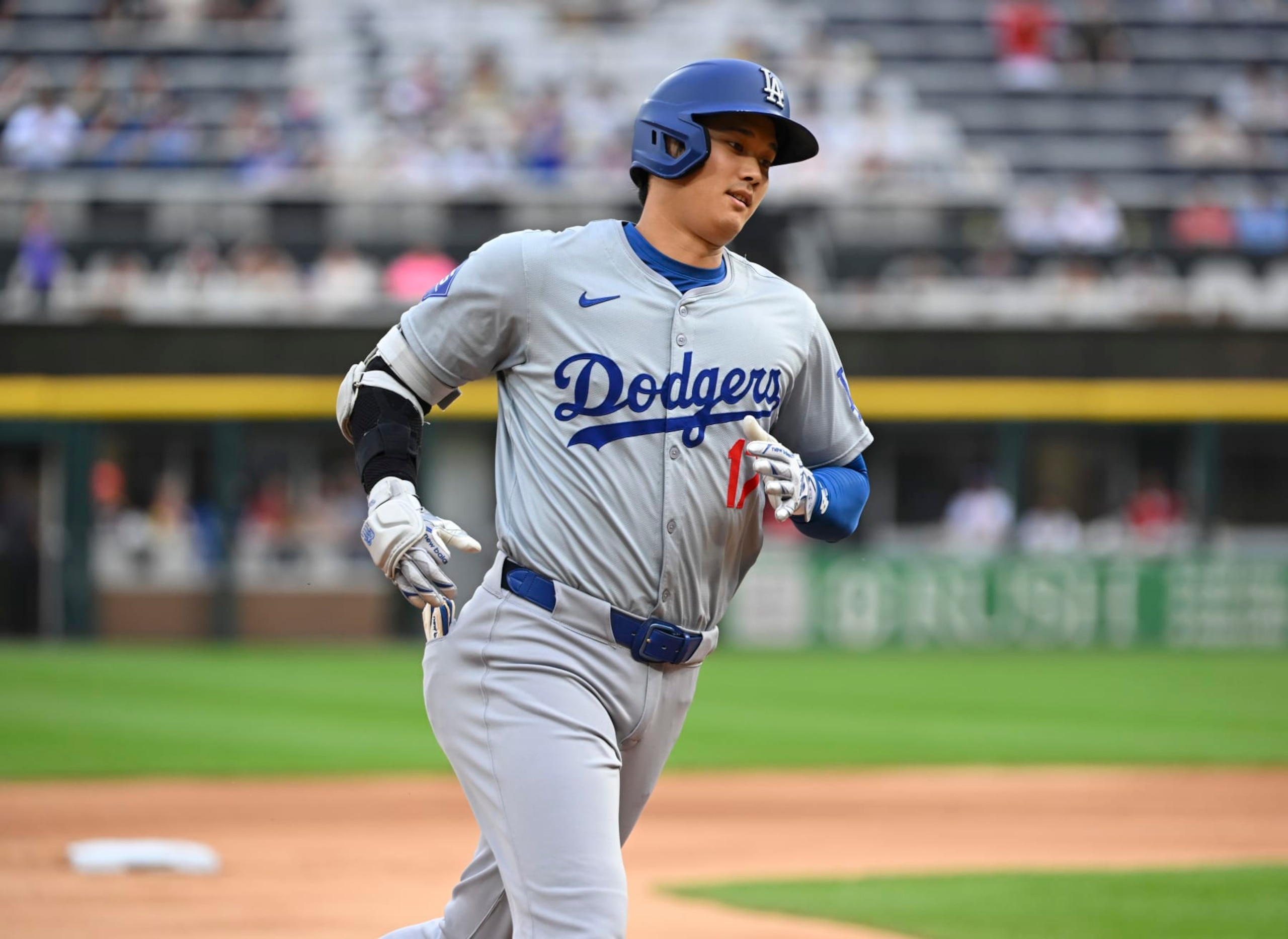 CHICAGO, ILLINOIS - JUNE 25: Shohei Ohtani #17 of the Los Angeles Dodgers hits a home run during the first inning of a game against the Chicago White Sox at Guaranteed Rate Field on June 25, 2024 in Chicago, Illinois. (Photo by Nuccio DiNuzzo/Getty Images)