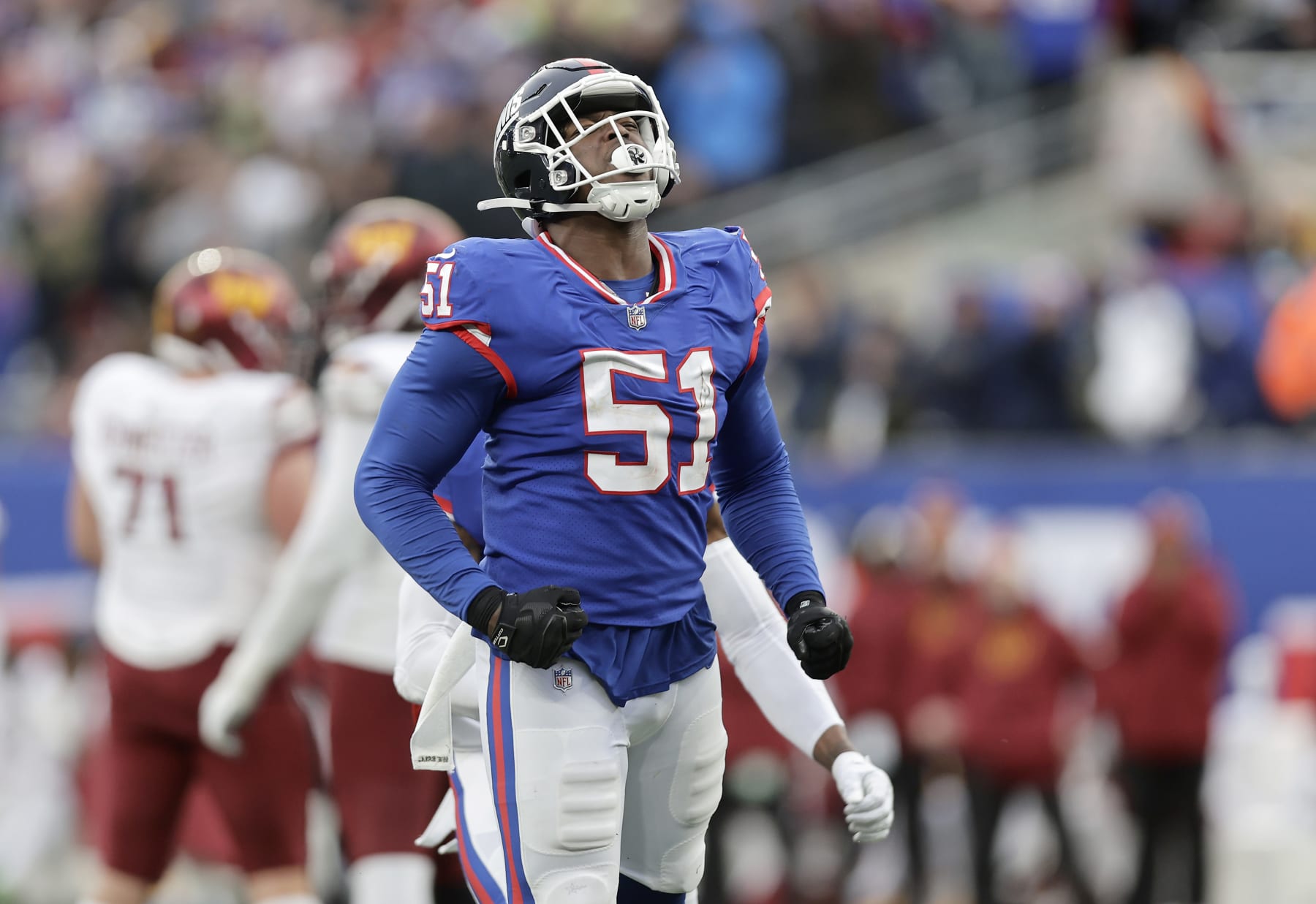 EAST RUTHERFORD, NEW JERSEY - DECEMBER 04: (NEW YORK DAILIES OUT) Azeez Ojulari #51 of the New York Giants in action against the Washington Commanders at MetLife Stadium on December 04, 2022 in East Rutherford, New Jersey. The game ended in a 20-20 tie. (Photo by Jim McIsaac/Getty Images)