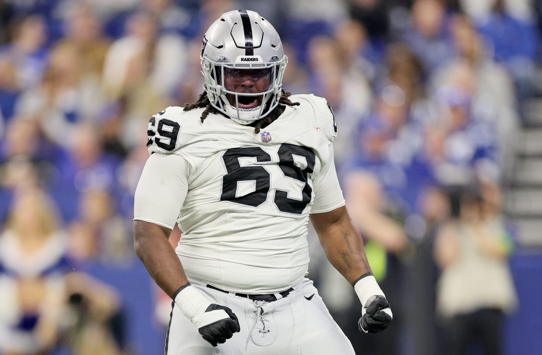 INDIANAPOLIS, INDIANA - DECEMBER 31: Adam Butler #69 of the Las Vegas Raiders celebrates in the game against the Indianapolis Colts at Lucas Oil Stadium on December 31, 2023 in Indianapolis, Indiana. (Photo by Andy Lyons/Getty Images)