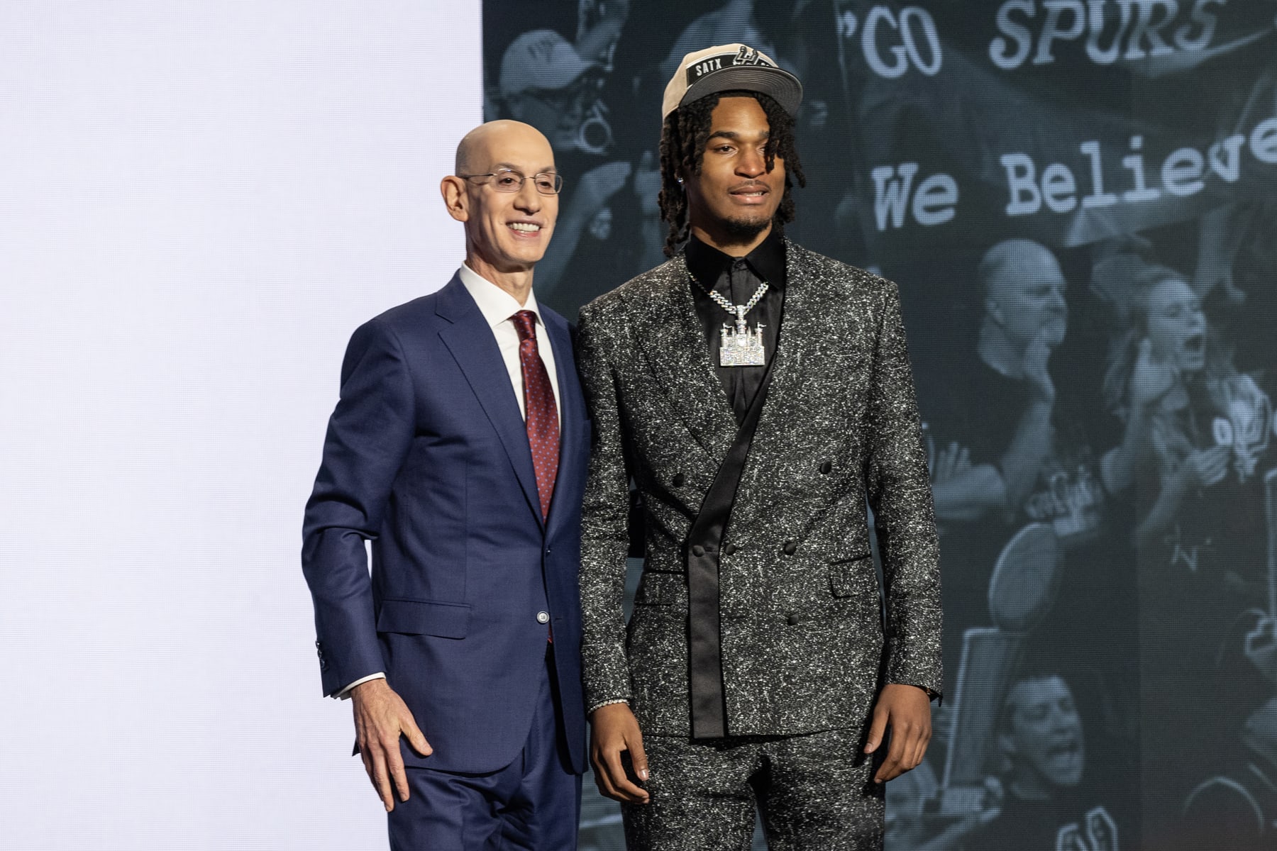 NEW YORK, UNITED STATES - JUNE 26: Commissioner Adam Silver shakes hands with Stephon Castle, selected as number four by the San Antonio Spurs, in the first round of the 2024 NBA Draft at the Barclays Center in Brooklyn, New York on June 26, 2024 (Photo by Lev Radin/Anadolu via Getty Images)