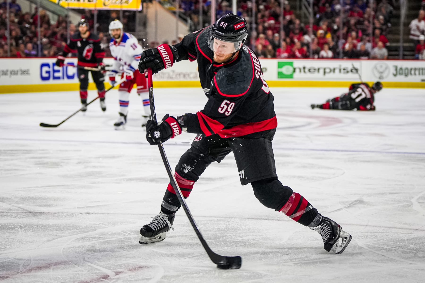 RALEIGH, NORTH CAROLINA - MAY 16: Jake Guentzel #59 of the Carolina Hurricanes shoots the puck during the third period against the New York Rangers in Game Six of the Second Round of the 2024 Stanley Cup Playoffs at PNC Arena on May 16, 2024 in Raleigh, North Carolina.  (Photo by Josh Lavallee/NHLI via Getty Images)