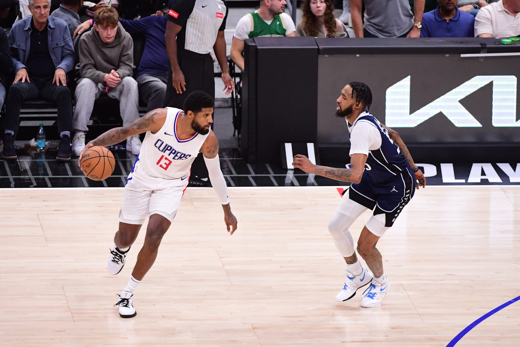 LOS ANGELES, CA - MAY 1: Paul George #13 of the LA Clippers handles the ball during the game against the Dallas Mavericks during Round 1 Game 5 of the 2024 NBA Playoffs on May 1, 2024 at Crypto.Com Arena in Los Angeles, California. NOTE TO USER: User expressly acknowledges and agrees that, by downloading and/or using this Photograph, user is consenting to the terms and conditions of the Getty Images License Agreement. Mandatory Copyright Notice: Copyright 2024 NBAE (Photo by Adam Pantozzi/NBAE via Getty Images)