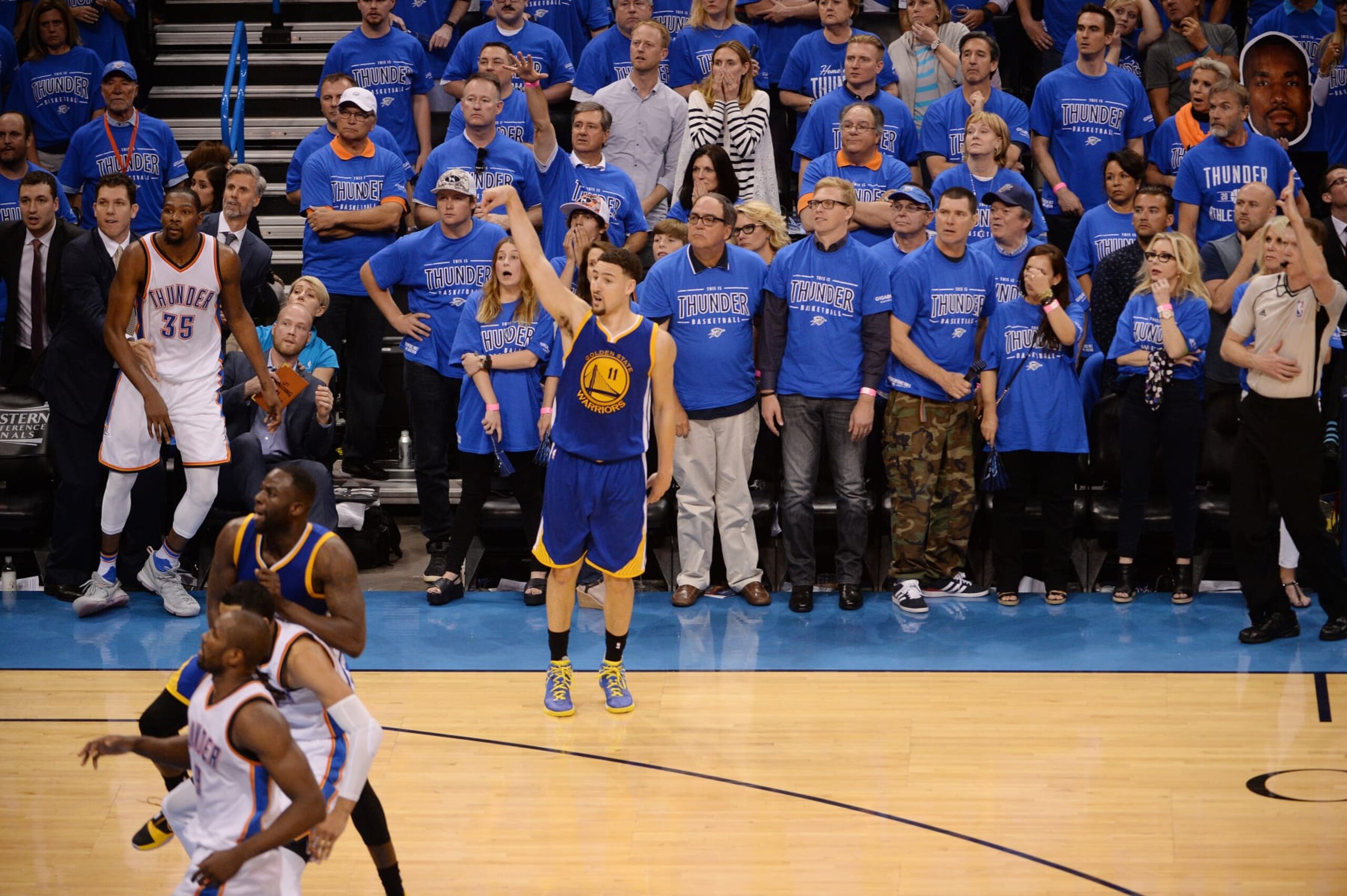 OKLAHOMA CITY, OK- MAY 28:  Klay Thompson #11 of the Golden State Warriors celebrates during the game against the Oklahoma City Thunder in Game Six of the Western Conference Finals during the 2016 NBA Playoffs on May 28, 2016 at Chesapeake Energy Arena in Oklahoma City, Oklahoma. NOTE TO USER: User expressly acknowledges and agrees that, by downloading and or using this photograph, User is consenting to the terms and conditions of the Getty Images License Agreement. Mandatory Copyright Notice: Copyright 2016 NBAE (Photo by Noah Graham/NBAE via Getty Images)
