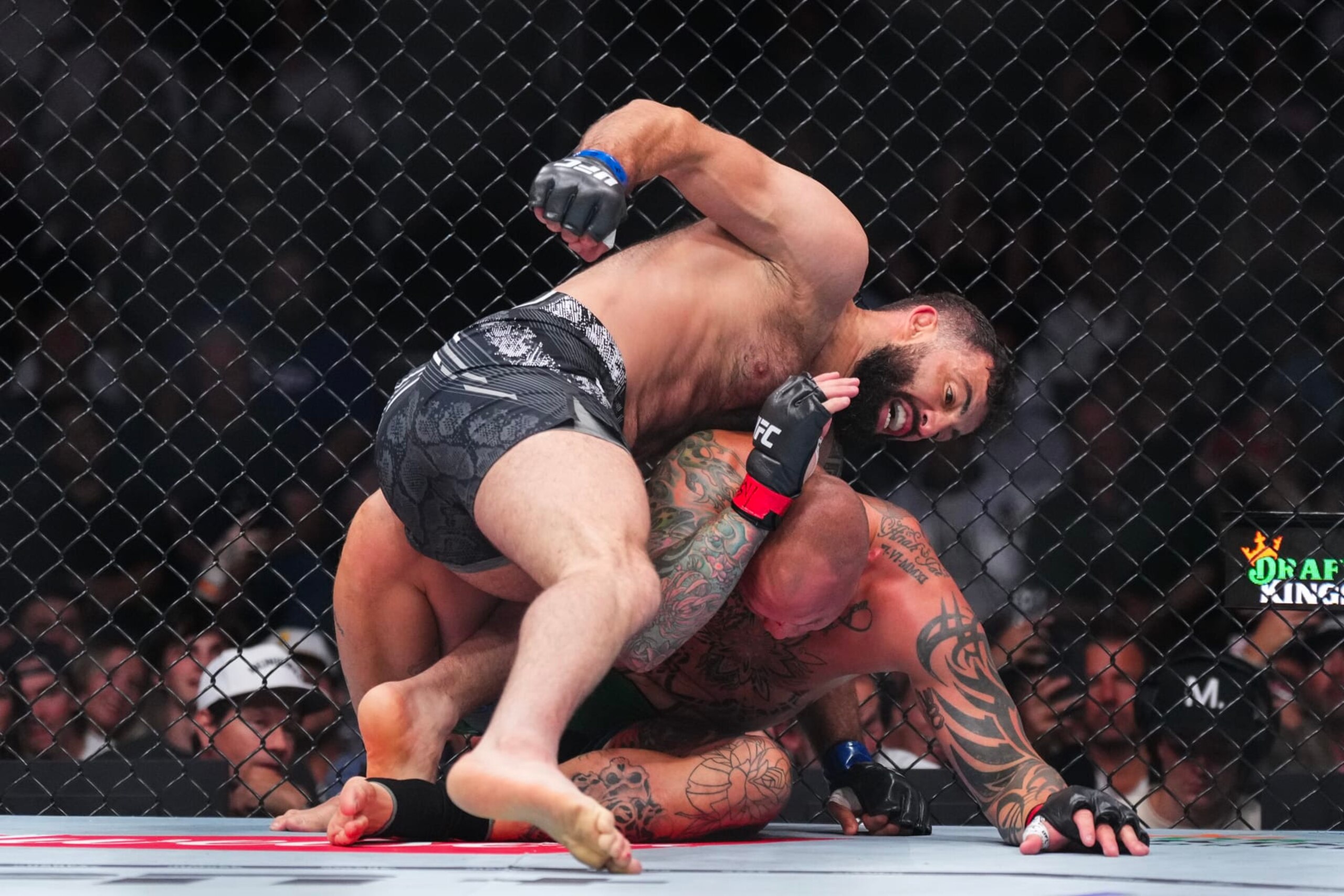 Roman Dolidze punches Anthony Smith. Roman Dolidze punches Anthony Smith.