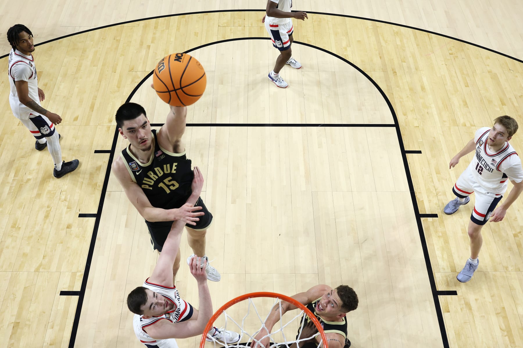 GLENDALE, ARIZONA - APRIL 08: (EDITORS NOTE: Image taken using a remote camera.) Zach Edey #15 of the Purdue Boilermakers shoots the ball during the second half in the NCAA Men's Basketball Tournament National Championship game at State Farm Stadium on April 08, 2024 in Glendale, Arizona. (Photo by Brett Wilhelm/NCAA Photos via Getty Images)
