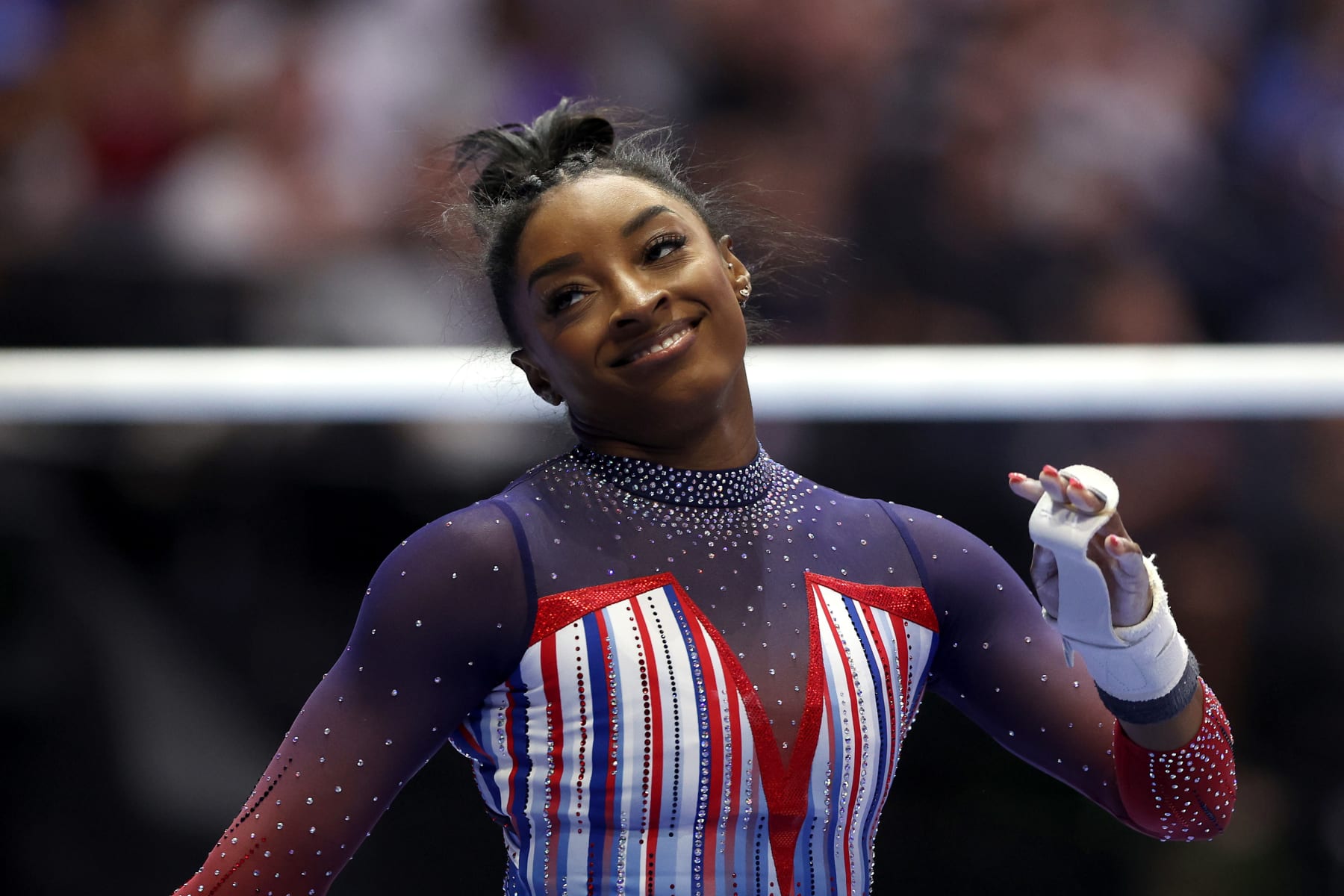 MINNEAPOLIS, MINNESOTA - JUNE 30: Simone Biles reacts after finishing her routine on the uneven bars on Day Four of the 2024 U.S. Olympic Team Gymnastics Trials at Target Center on June 30, 2024 in Minneapolis, Minnesota. (Photo by Jamie Squire/Getty Images)