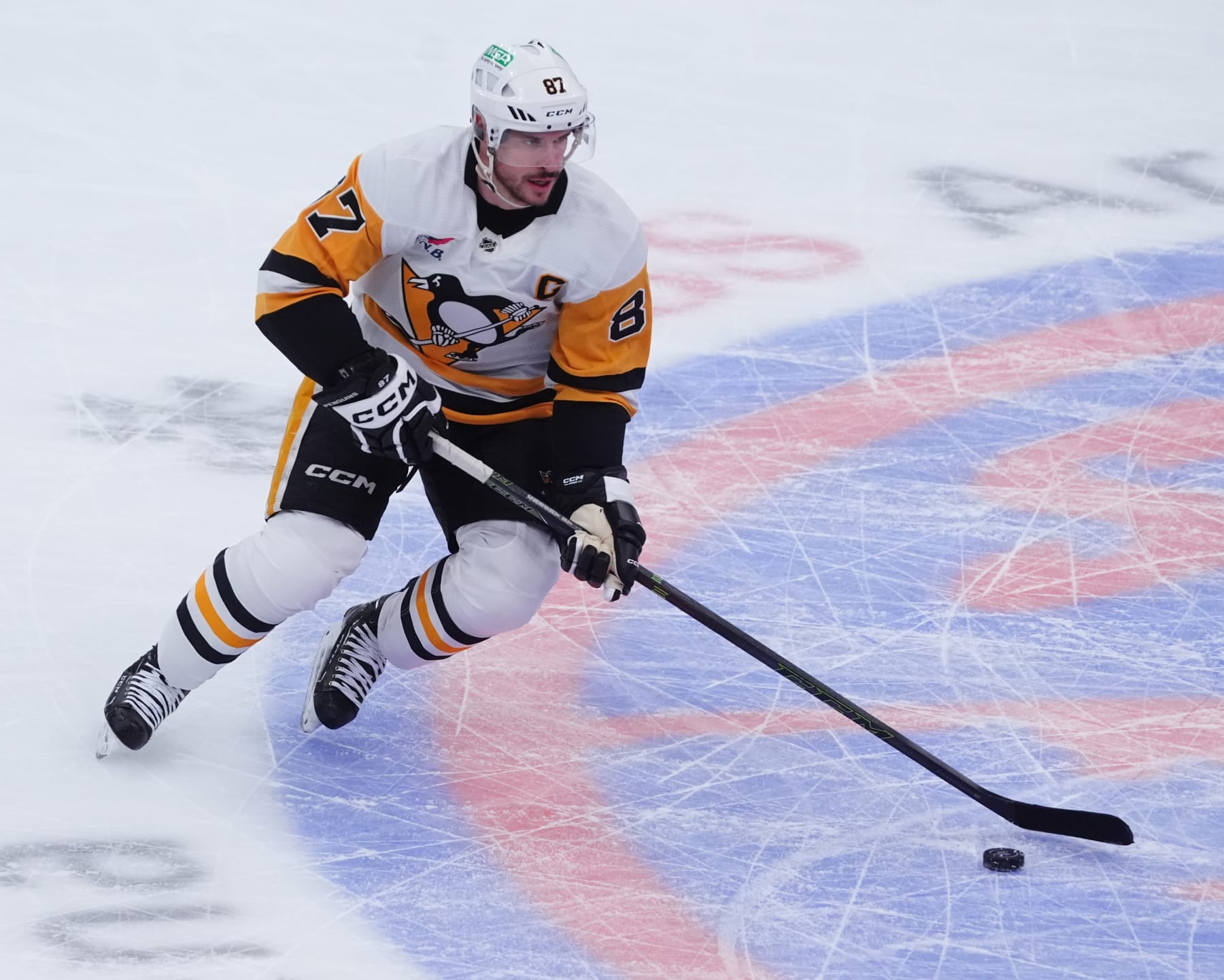 ELMONT, NY - APRIL 17: Pittsburgh Penguins Center Sidney Crosby (87) skates with the puck during the first period of the National Hockey League game between the Pittsburgh Penguins and the New York Islanders on April 17, 2024, at UBS Arena in Elmont, NY. (Photo by Gregory Fisher/Icon Sportswire via Getty Images)