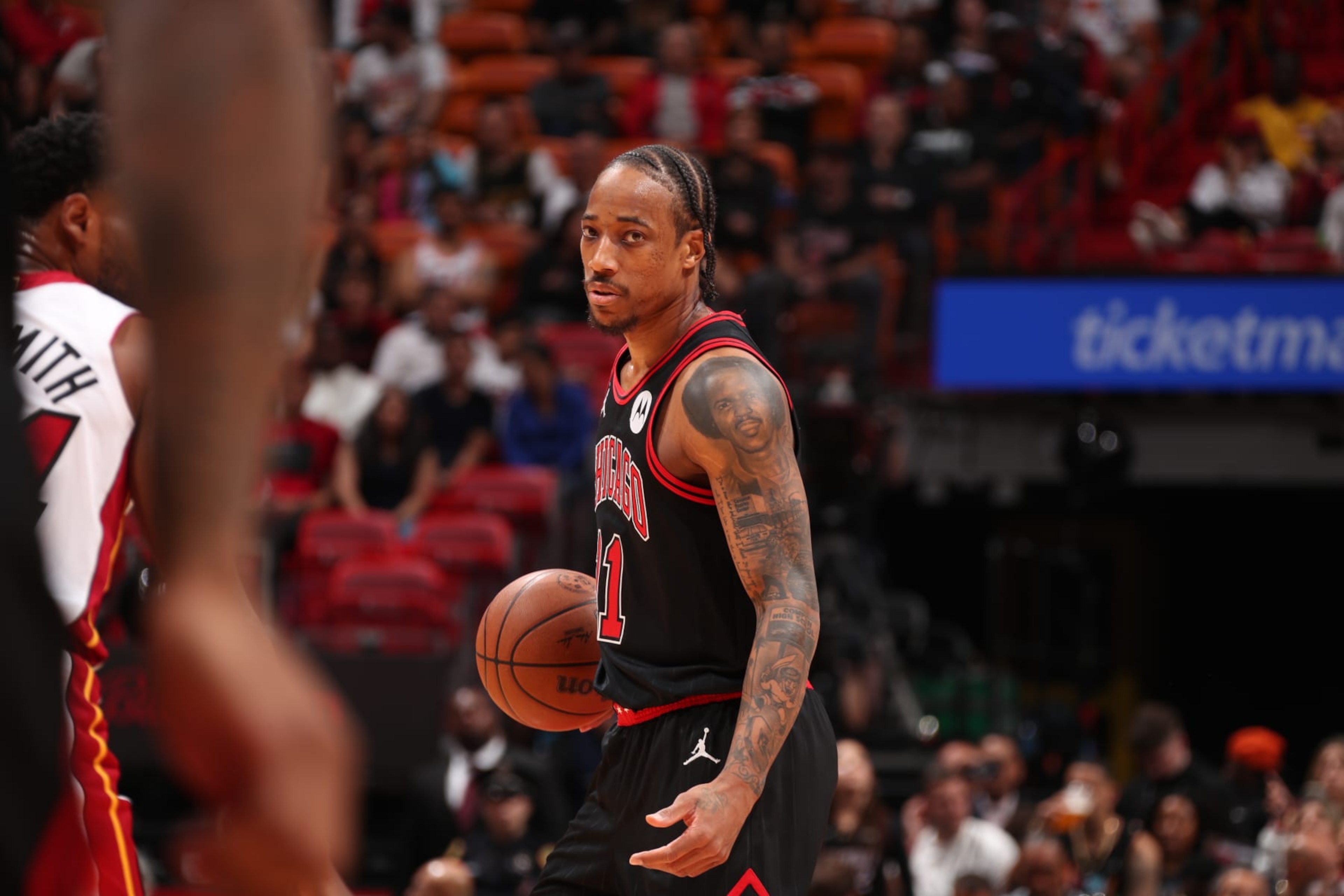 MIAMI, FL - APRIL 19: DeMar DeRozan #11 of the Chicago Bulls handles the ball during the game against the Miami Heat during the 2024 Play-In Tournament on April 19, 2024 at Kaseya Center in Miami, Florida. NOTE TO USER: User expressly acknowledges and agrees that, by downloading and or using this Photograph, user is consenting to the terms and conditions of the Getty Images License Agreement. Mandatory Copyright Notice: Copyright 2024 NBAE (Photo by Issac Baldizon/NBAE via Getty Images)