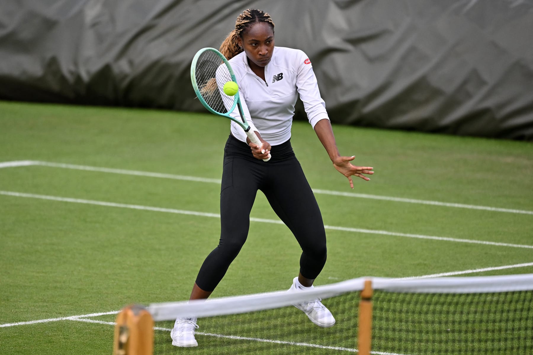 US player Coco Gauff takes part in a training session ahead of the 2024 Wimbledon Championships at The All England Lawn Tennis and Croquet Club in Wimbledon, southwest London, on June 30, 2024. (Photo by Glyn KIRK / AFP) / RESTRICTED TO EDITORIAL USE (Photo by GLYN KIRK/AFP via Getty Images)